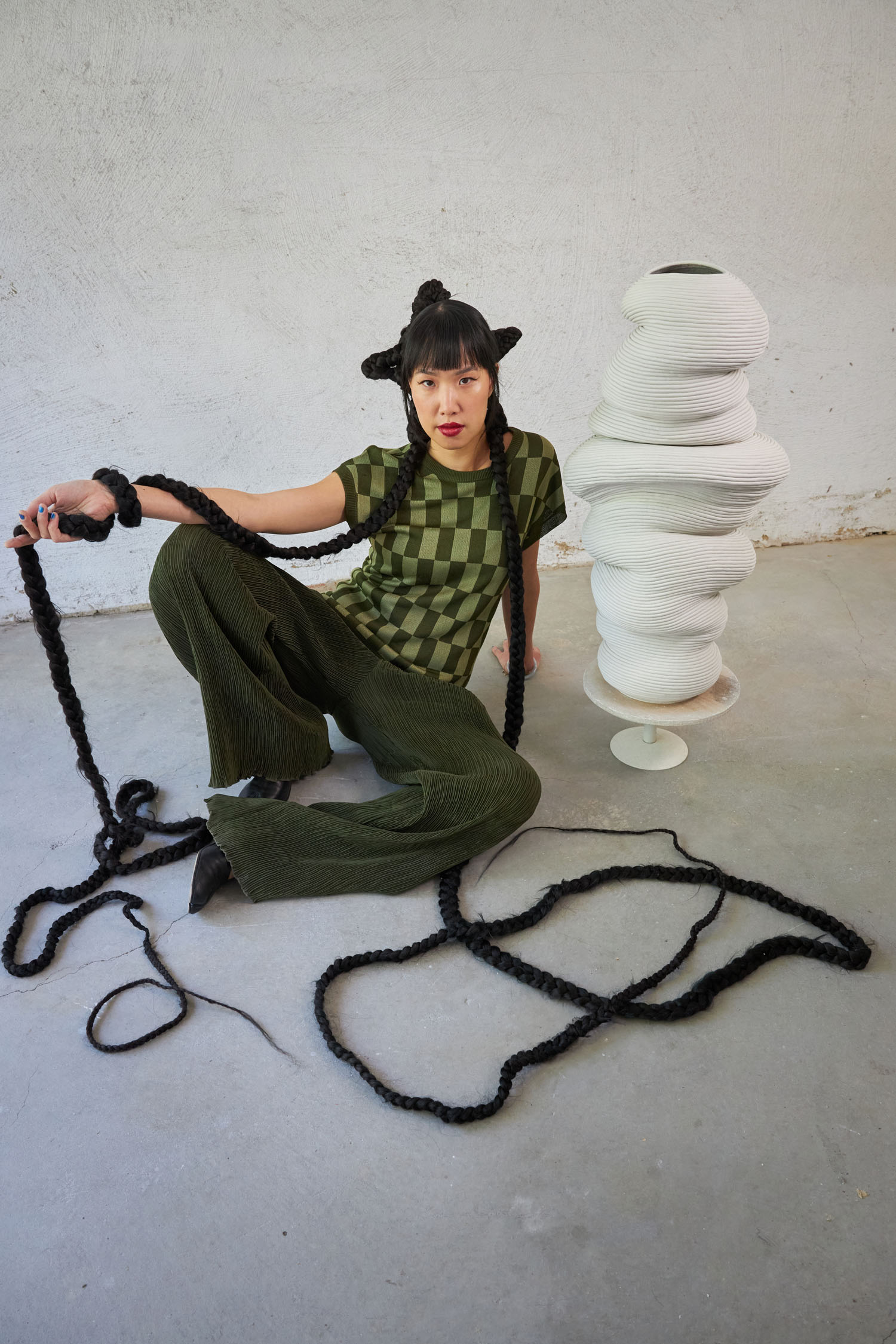 Zhu Ohmu wearing Kate Sylvester in her studio. Photo / Wayne Conway
