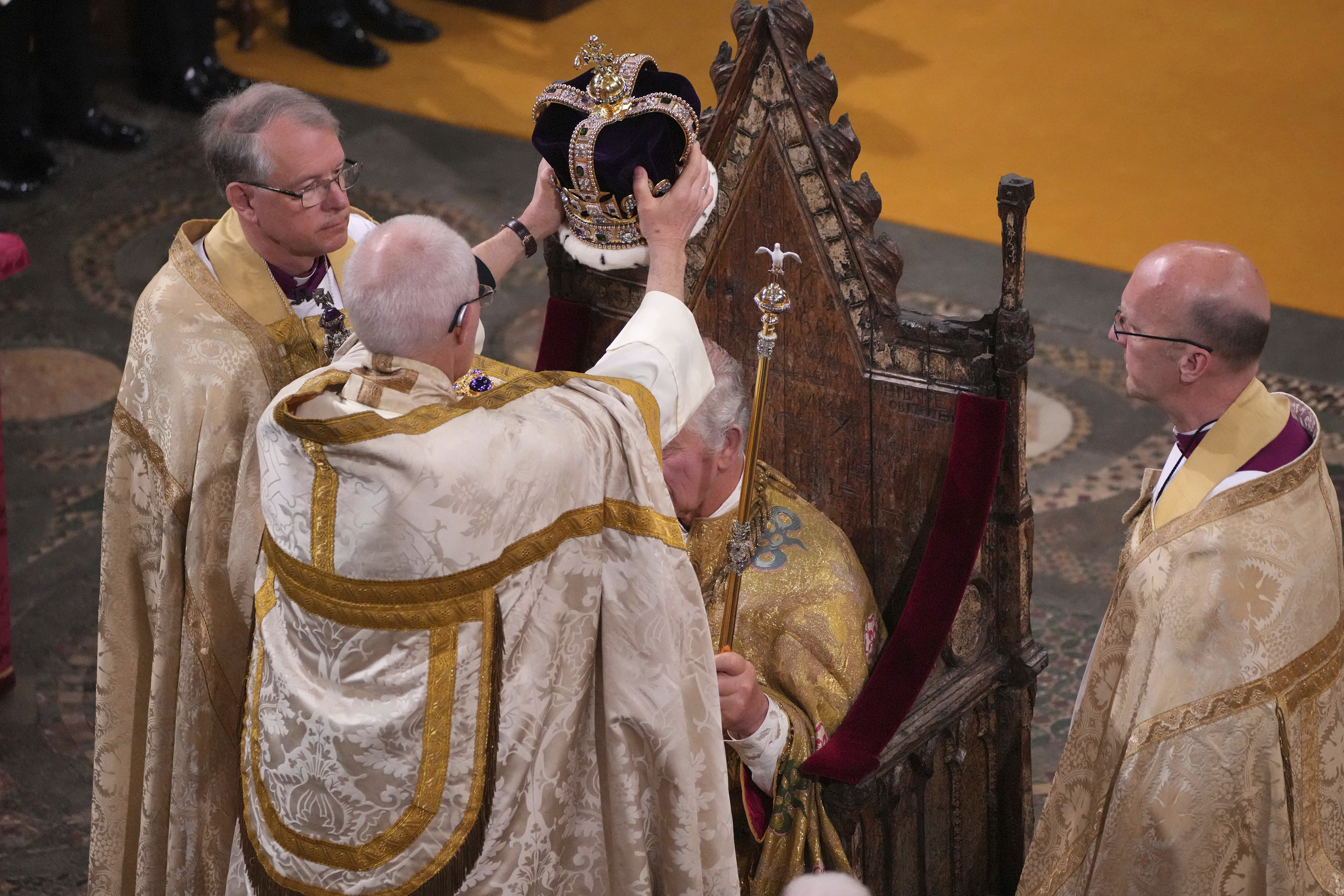 King Charles III is crowned with St Edward's Crown by The Archbishop of Canterbury Justin Welby. Photo / AP