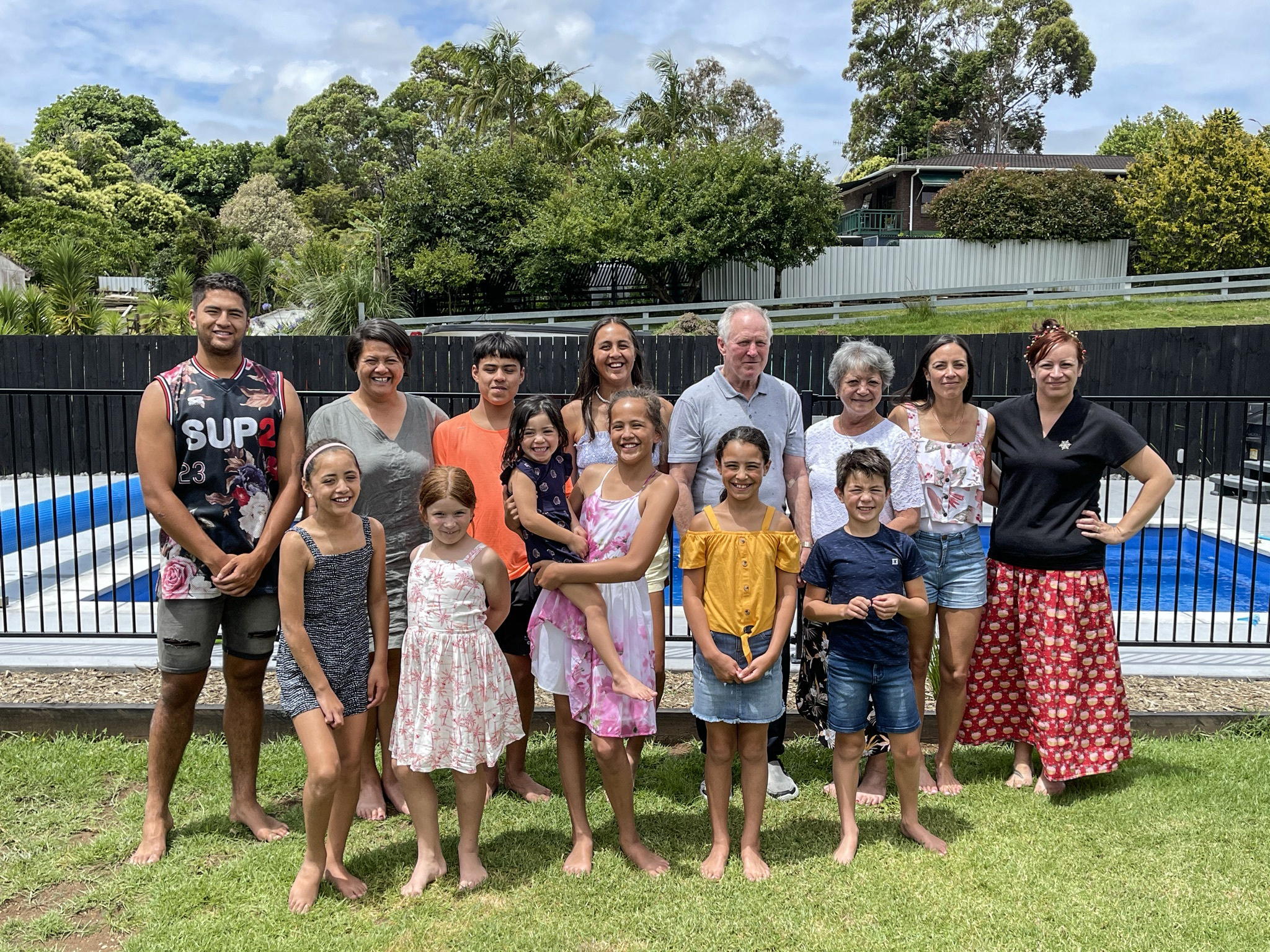 Former All Black Bruce Robertson (fourth from right back row) surrounded by his loving family.