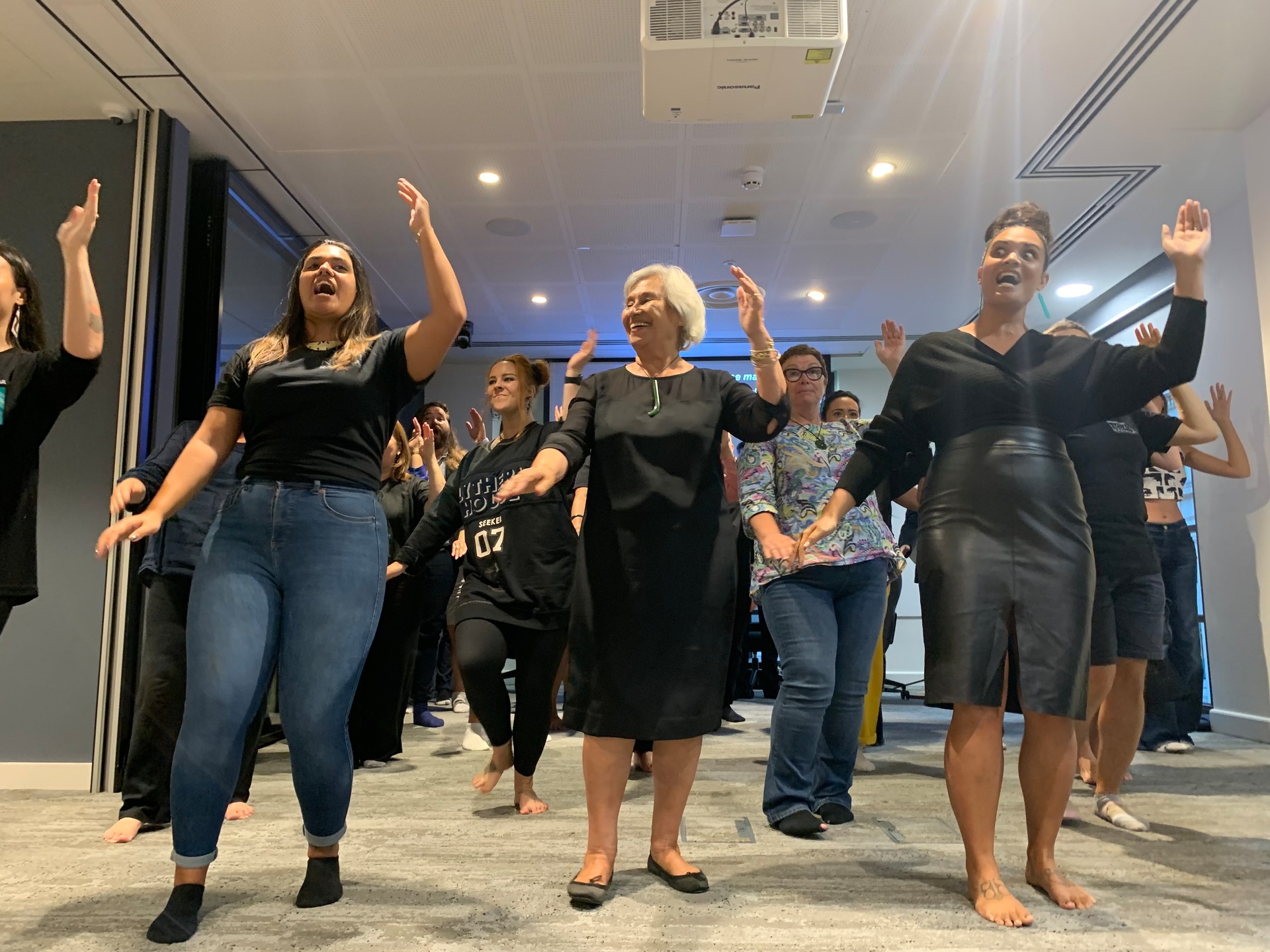 Whaea Esther Jessop (centre) performs kapa haka alongside fellow Ngāti Rānana members Kaitlyn Potter and Charael Keane (right). Photo / Adam Pearse