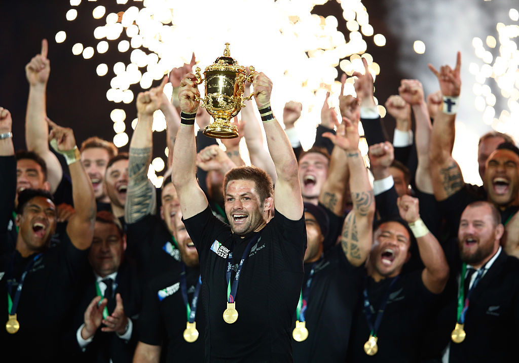 Richie McCaw lifts the William Webb Ellis Cup after his 148th and final test for the All Blacks. Photo / Getty