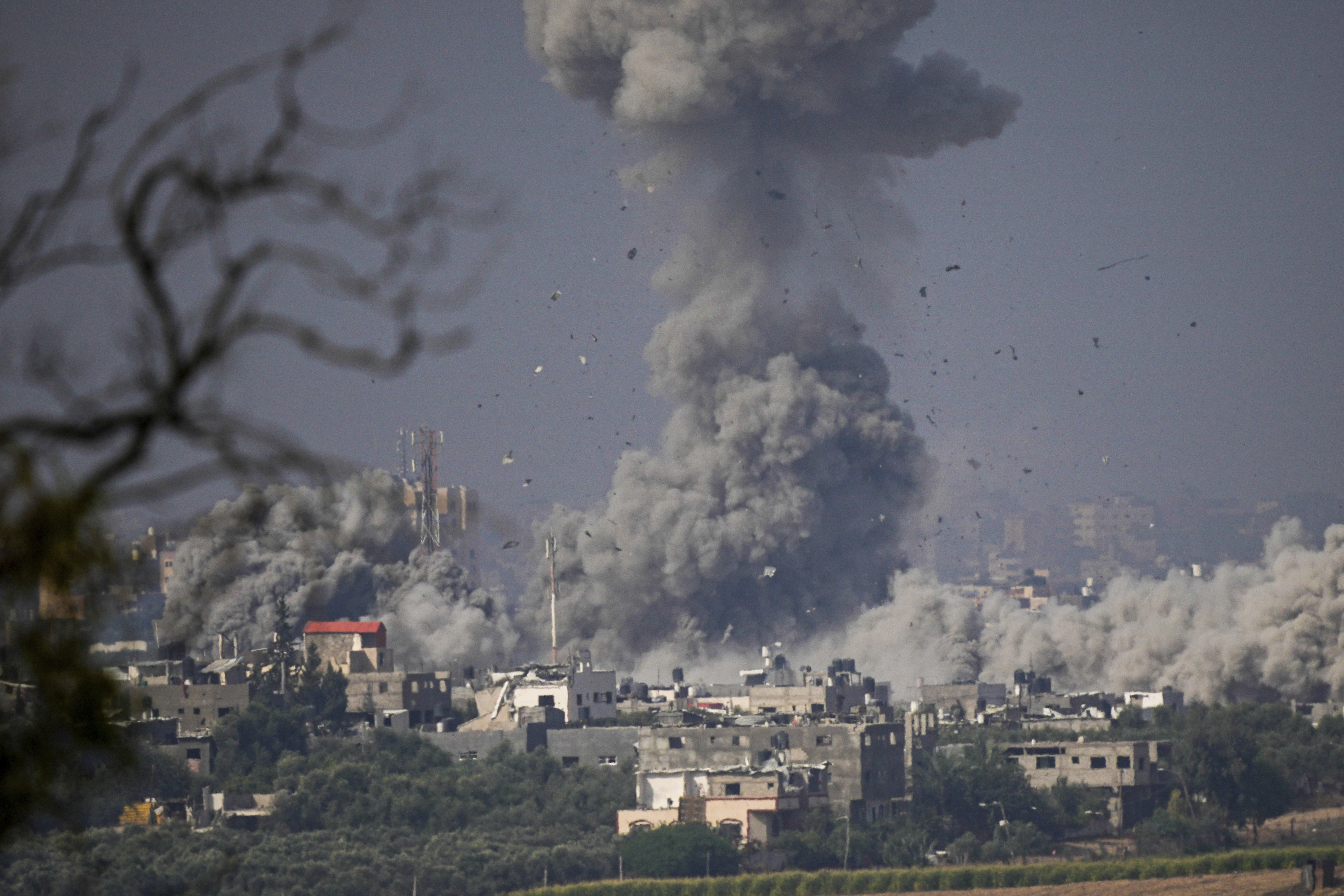 Smoke rises following an Israeli airstrike in the Gaza Strip, as seen from southern Israel. Photo / AP