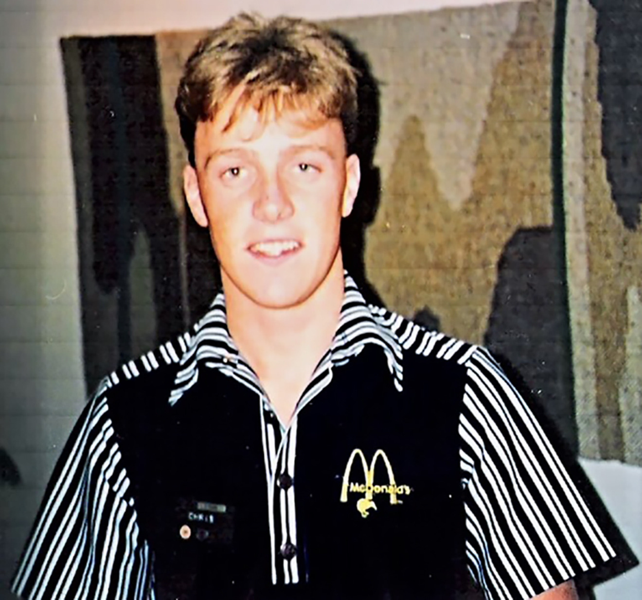 A young Christopher Luxon on the job at McDonald's. Photo / Supplied