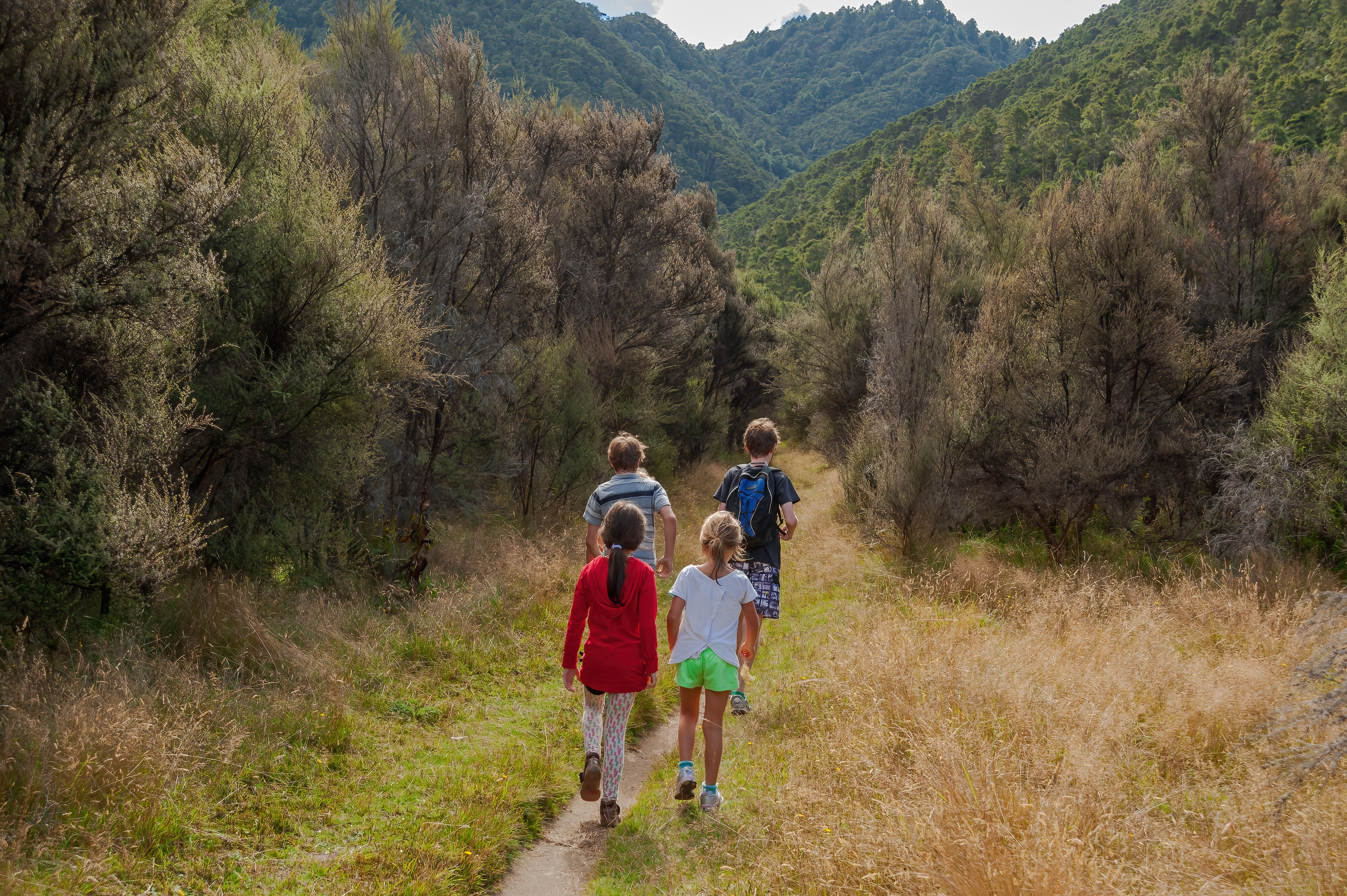 Children on Te Puia Track, Mōhaka Valley, Kaweka Forest Park, Hawke's Bay. Photo / Shaun Barnett