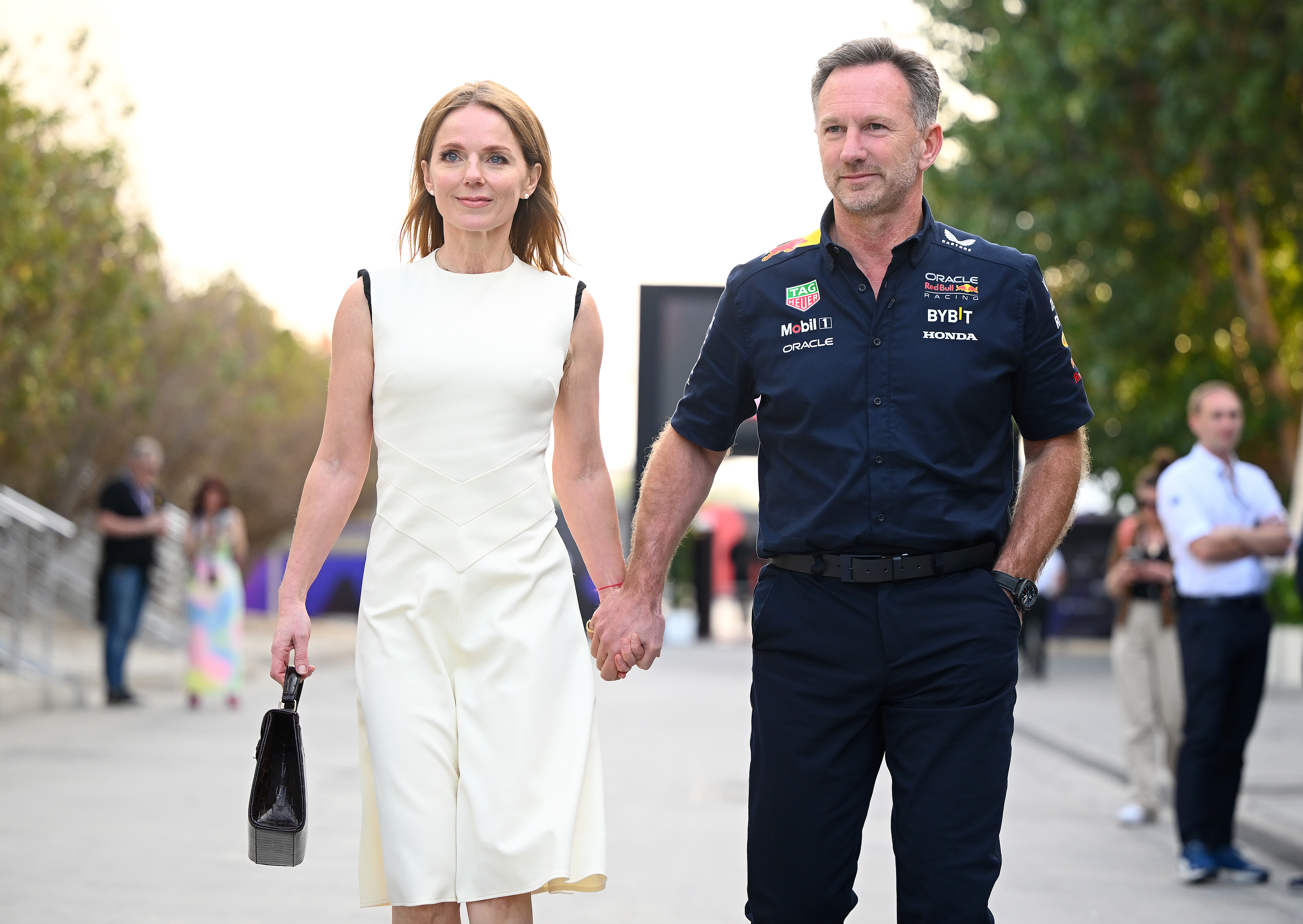 Oracle Red Bull racing team principal Christian Horner and Geri Horner walk in the Paddock holding hands before the F1 Grand Prix of Bahrain at Bahrain International Circuit on March 2 in Bahrain, Bahrain. (Photo / Clive Mason/Getty Images)