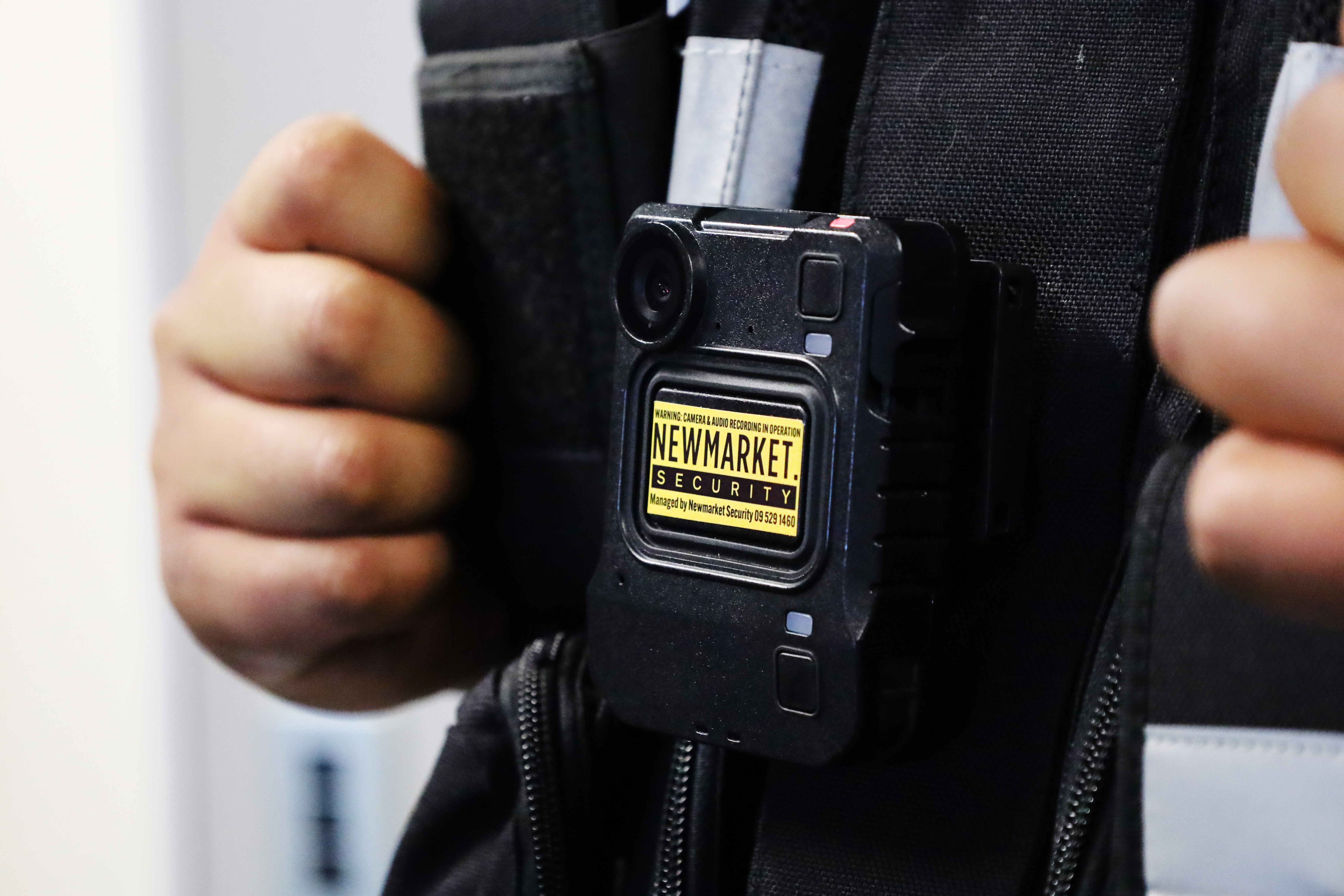 A Newmarket Security guard wears a bodycam. Photo / Jed Bradley