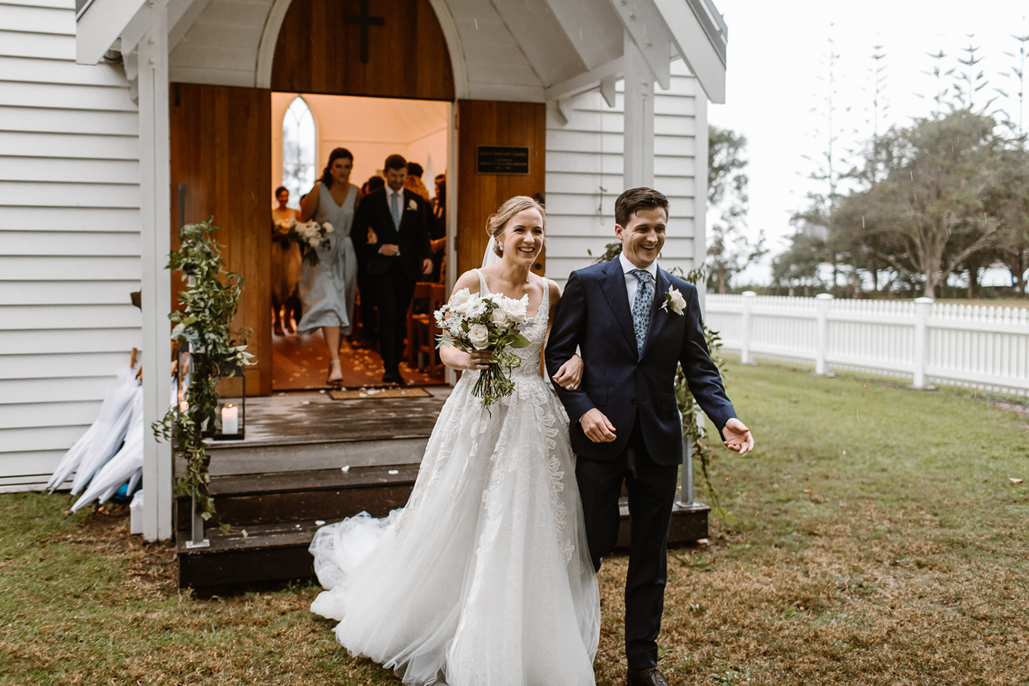 Rachael wears a dress from Hera Couture and Mark wears a Working Style suit. Photo / Frank and Peggy