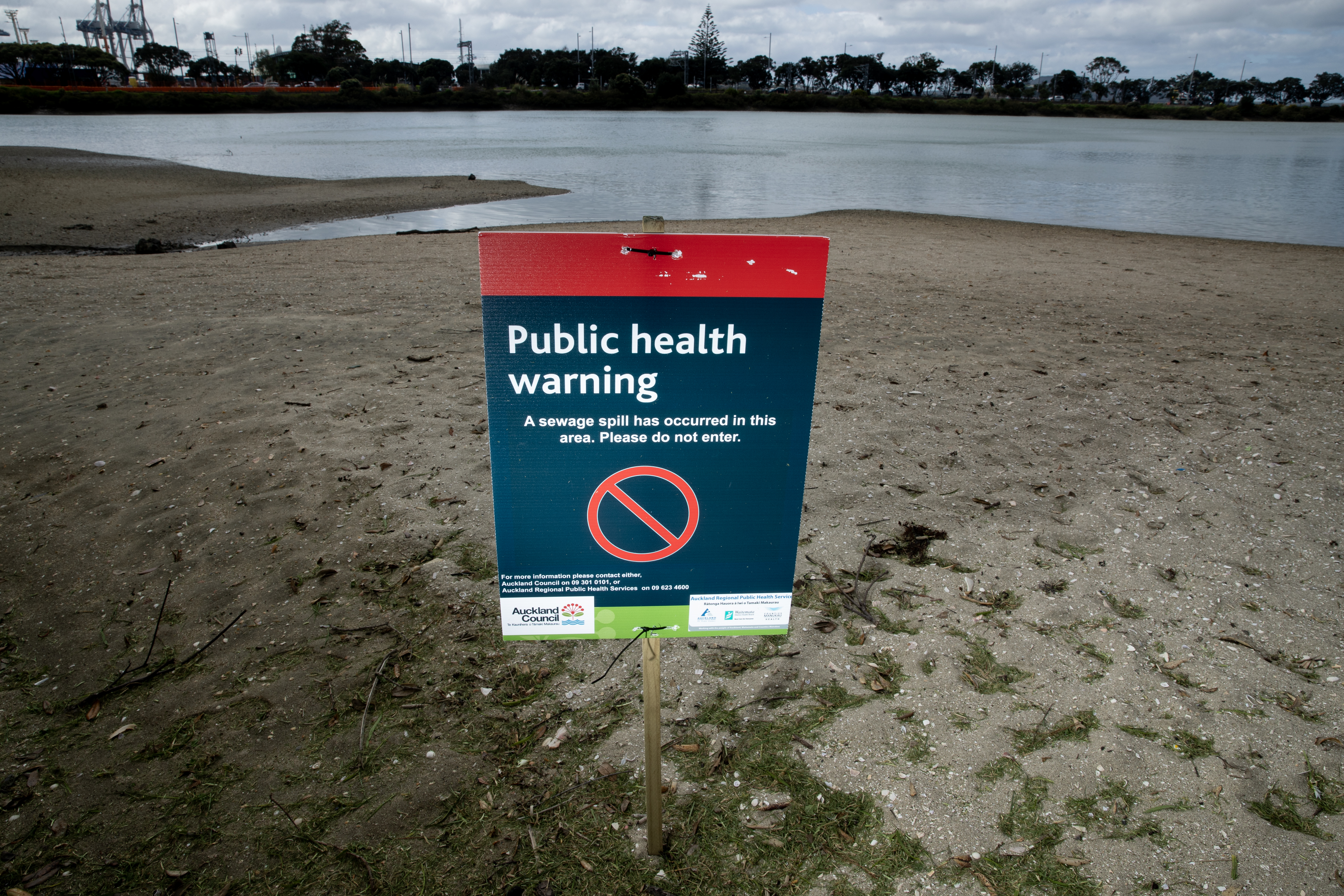 A warning sign at Judges Bay after a sewer pipe burst in Parnell. Photo / Dean Purcell