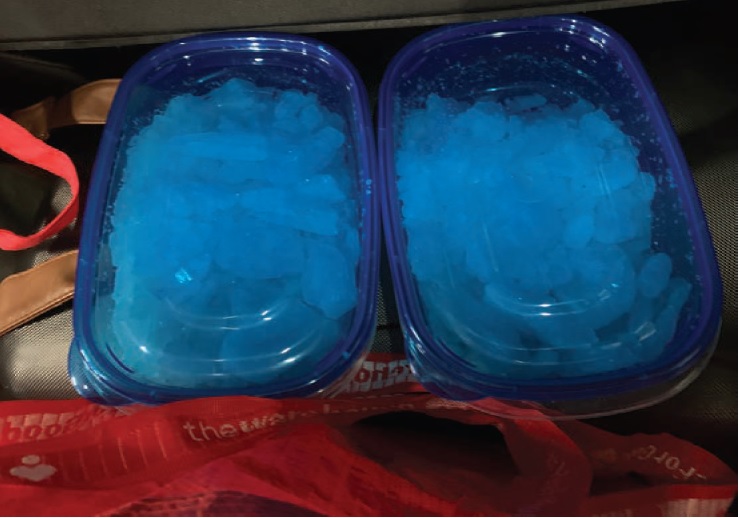 A police photograph of the two containers of drugs found in the Toyota Rav4. Photo / Supplied