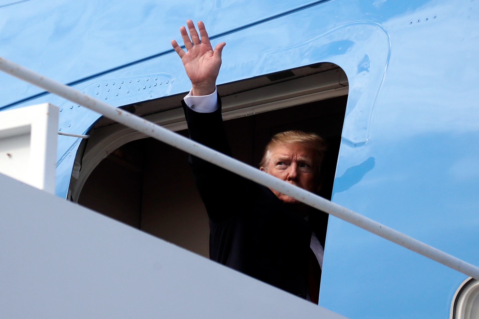 US President Donald Trump boards Air Force One at Palm Beach International Airport en route to Washington. Photo / AP