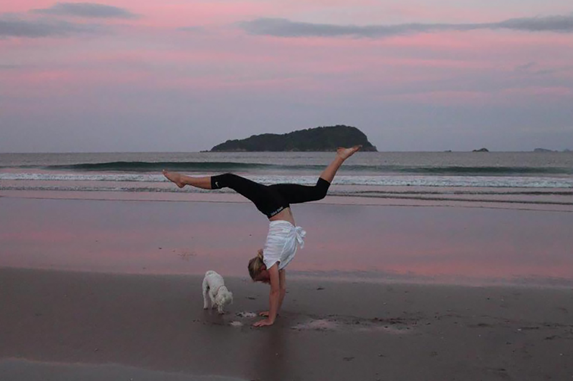 Cassandra with her dog Casey at Pauanui, age 14. Photo / Supplied