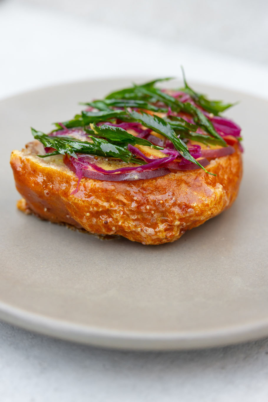 Lemon verbena-laden porchetta, from the early autumn menu at Queenstown's Sherwood restaurant. Photo / Jono Parker