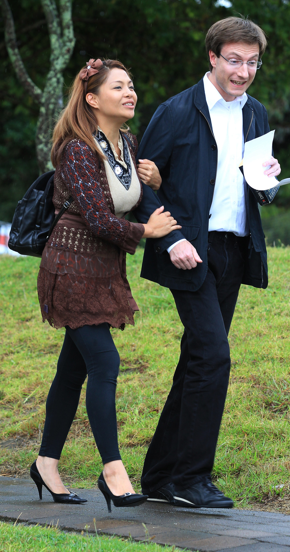 Asia Agcaoili, Bram van der Kolk's wife, greets Mathias Ortmann after he was given bail in 2012. Photo / File