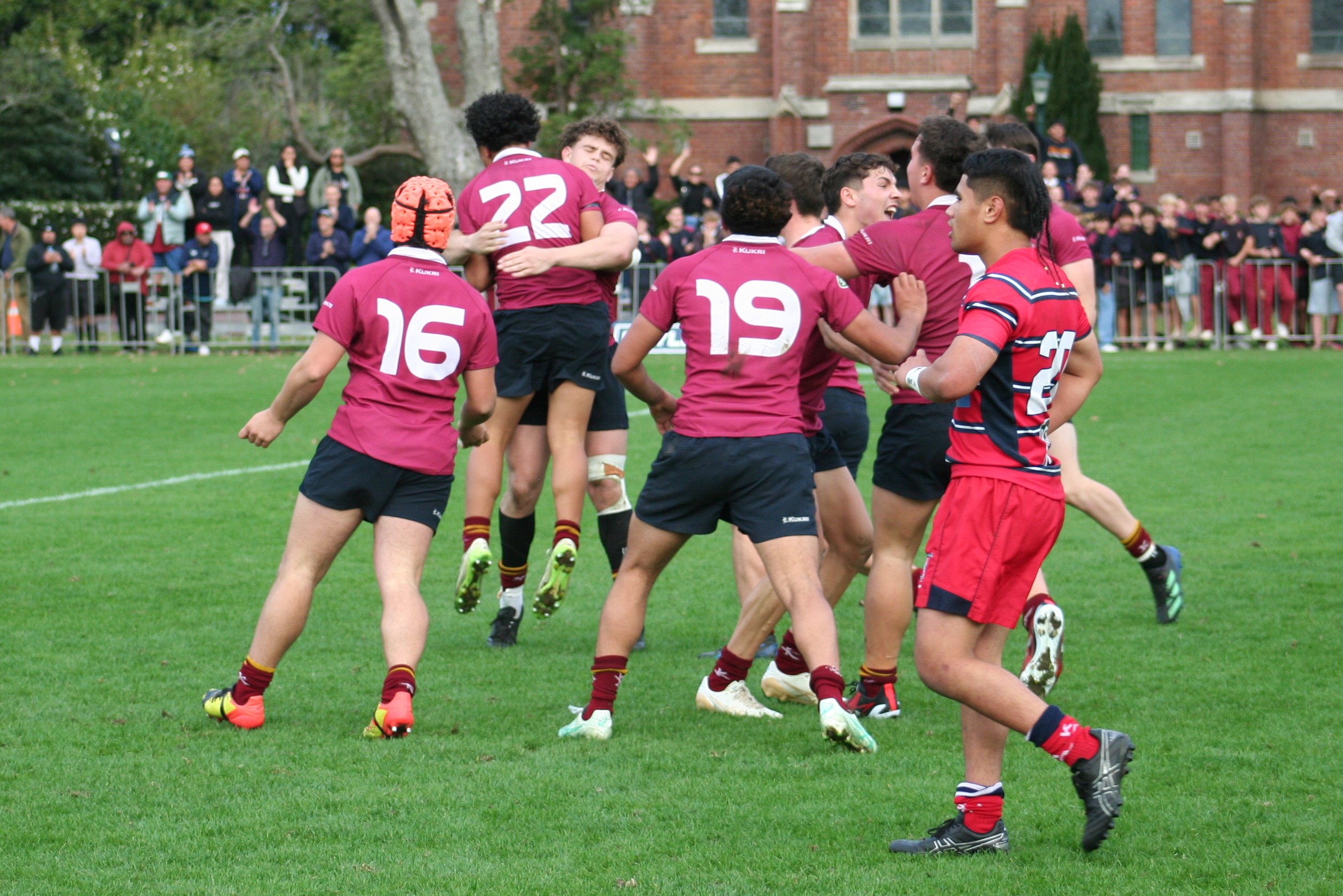 Final whistle celebrations from King's College after their close encounter with Kelston Boys' High. Photo / Bruce Holloway