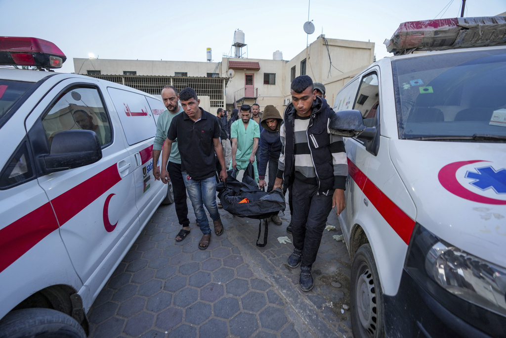 Palestinians carry the body of a World Central Kitchen worker at Al Aqsa hospital in Deir al-Balah, Gaza Strip. Photo / AP