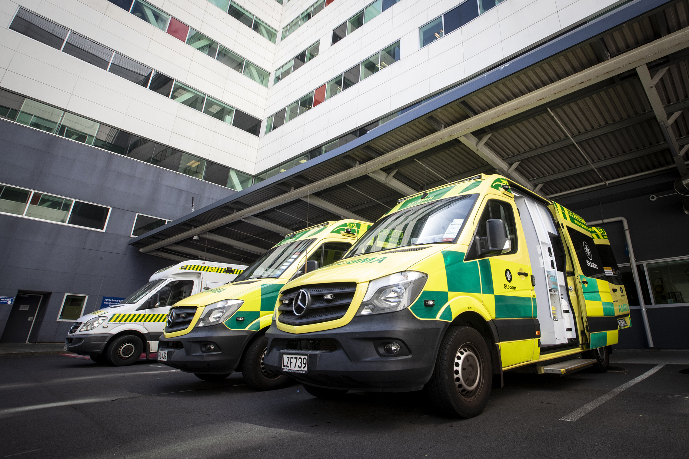 Ambulances wait outside Auckland City Hospital. Photo / Jason Oxenham