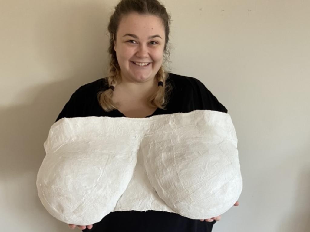 Melbourne woman was being 'crushed' by her size JJ breasts at 21