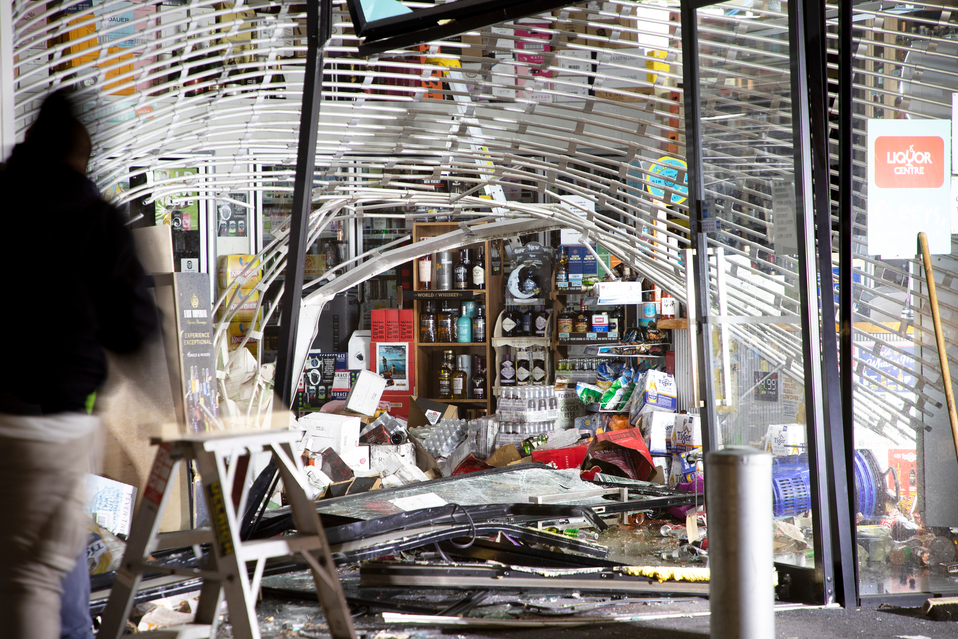 The scene of a ram raid burglary at a liquor store in Greenhithe, Auckland last year. Photo / Hayden Woodward