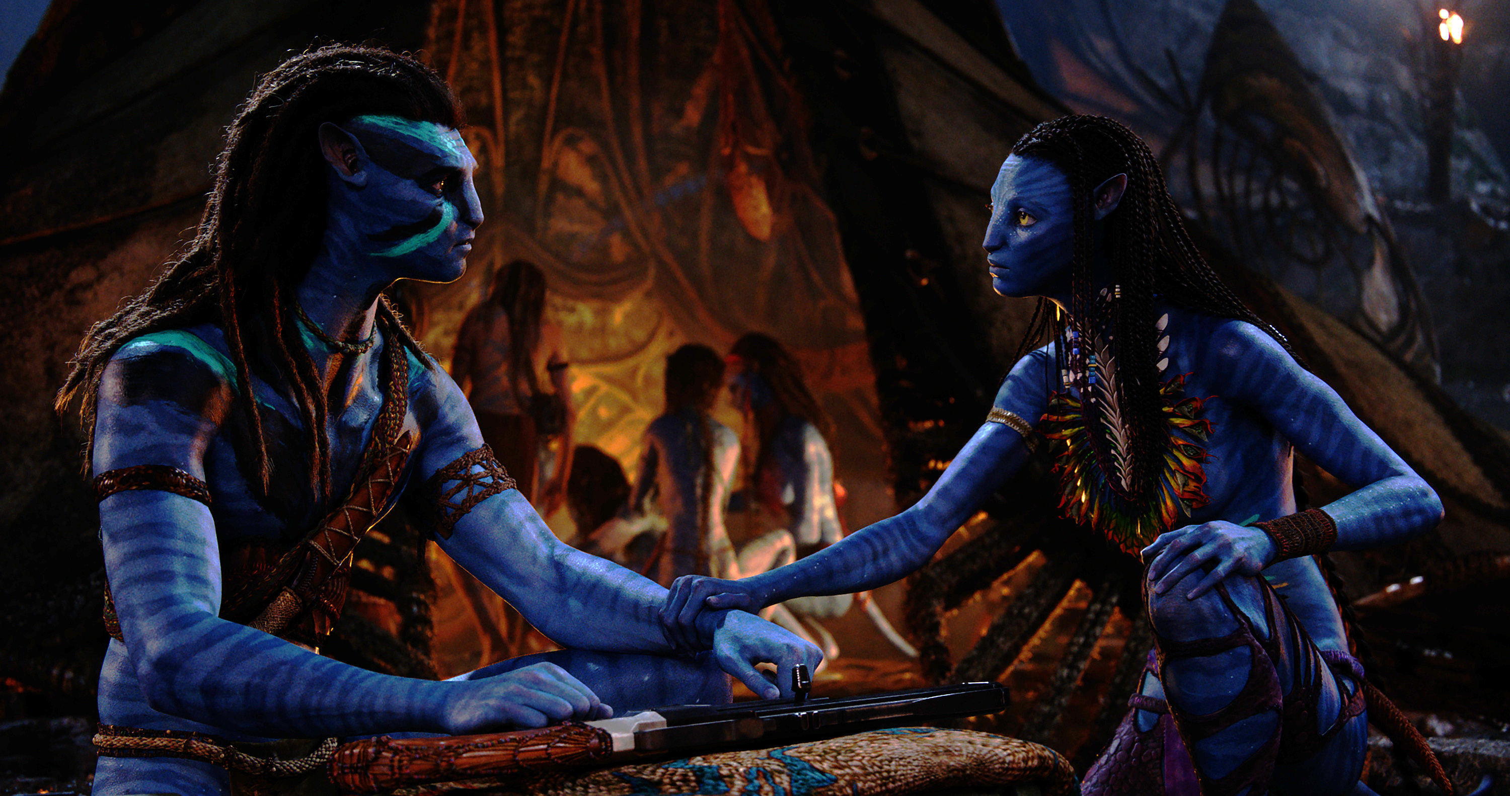 Jake Sully, performed by Sam Worthington, and Neytiri, performed by Zoe Saldana in a scene from Avatar: The Way of Water. Photo / 20th Century Studios, AP