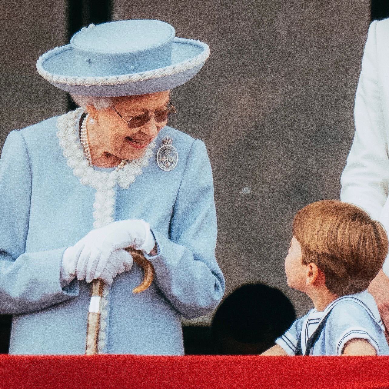 Queen Elizabeth II with Prince Louis on the balcony of Buckingham Palace after the Trooping the Colour ceremony. Photo / The Royal Family, Twitter