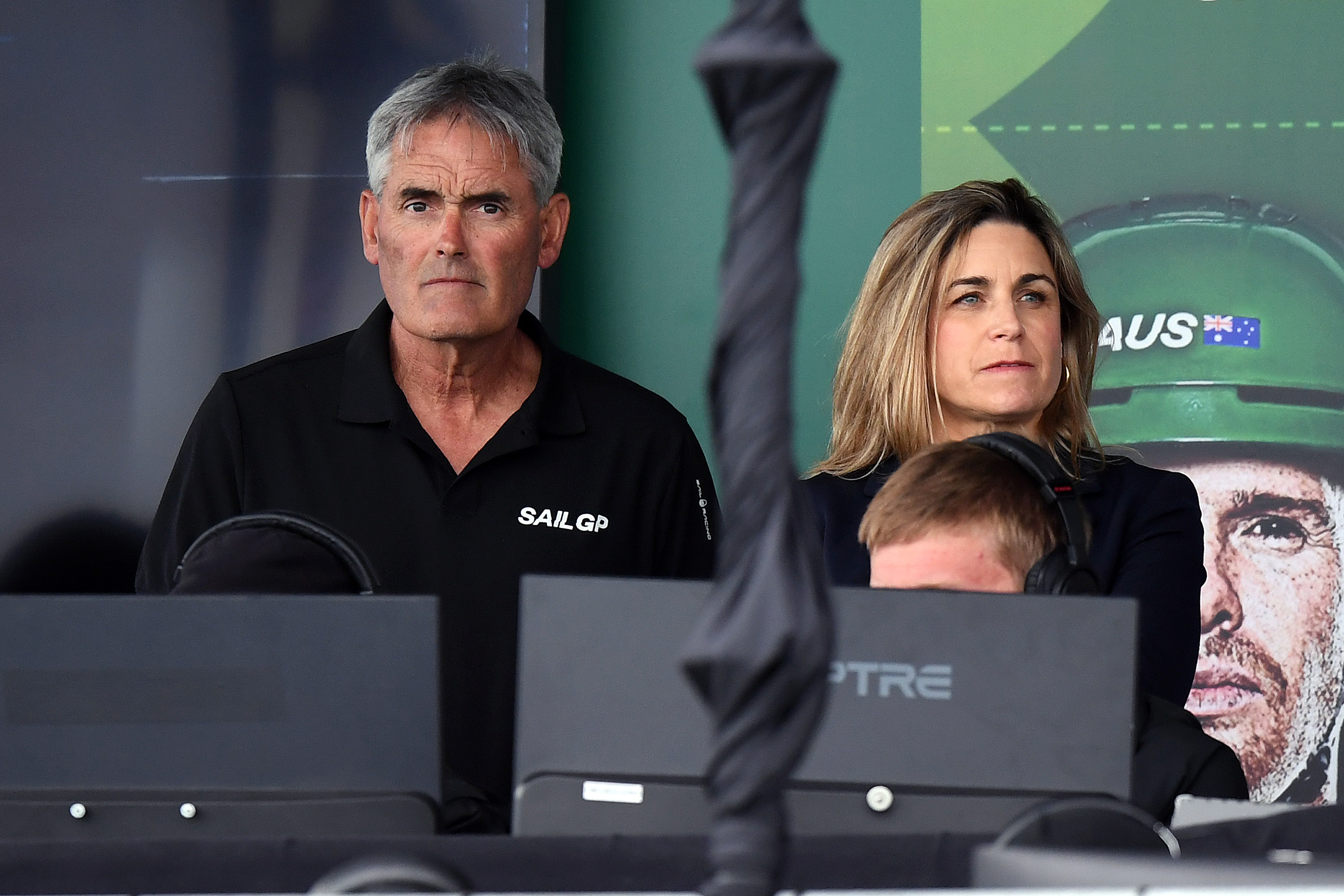 Sail GP CEO Sir Russell Coutts and Sail GP Chief of Staff Alejandra Mato (L-R) react as a dolphin on the course prevents racing. Photo / Getty Images