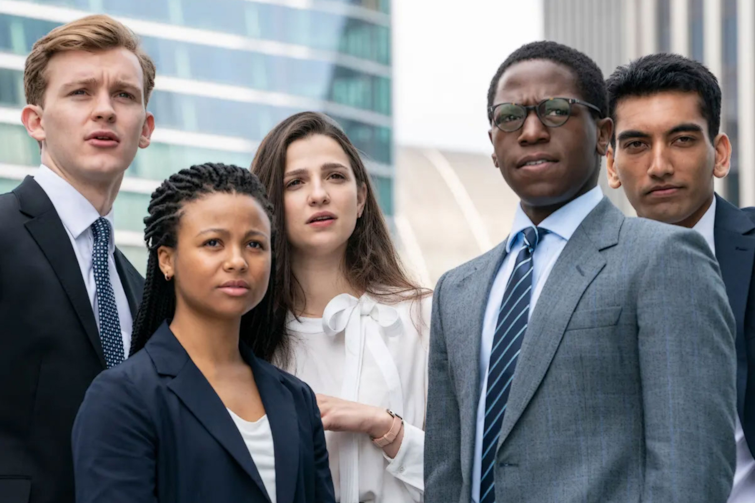 The cast of 'Industry'.