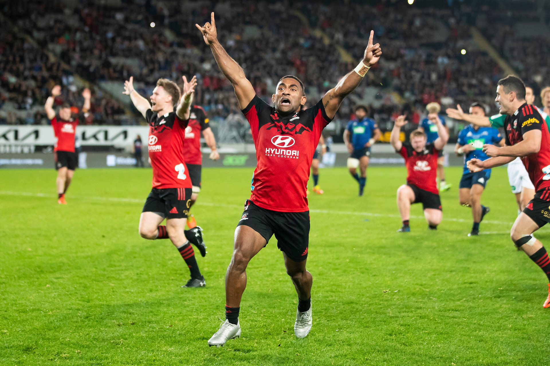 Crusaders winger Sevu Reece celebrates their win in the Final of the Super Rugby. Photo / Brett Phibbs  
