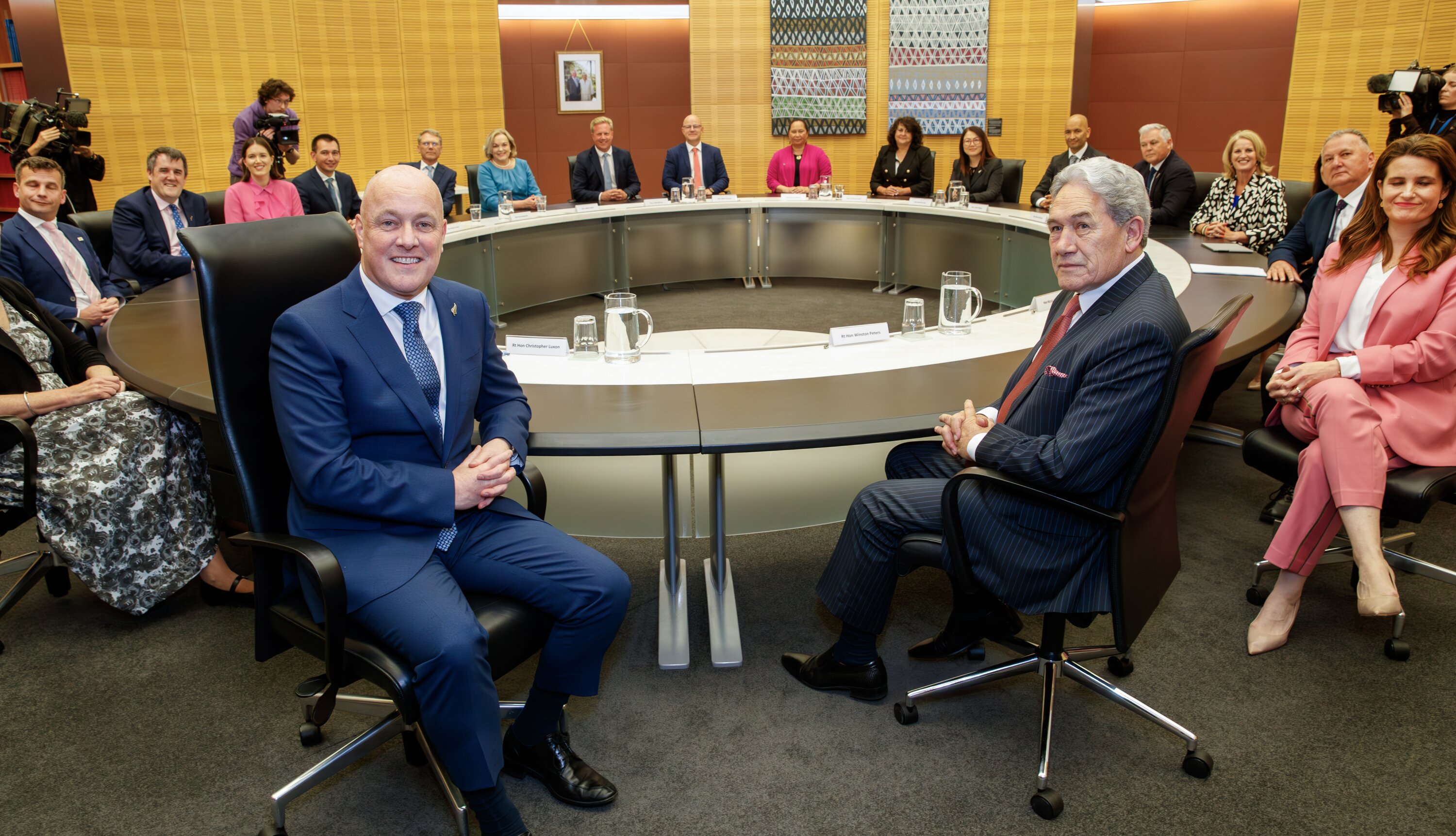 Prime Minister Christopher Luxon sitting with his fellow Cabinet members. Photo / Mark Mitchell