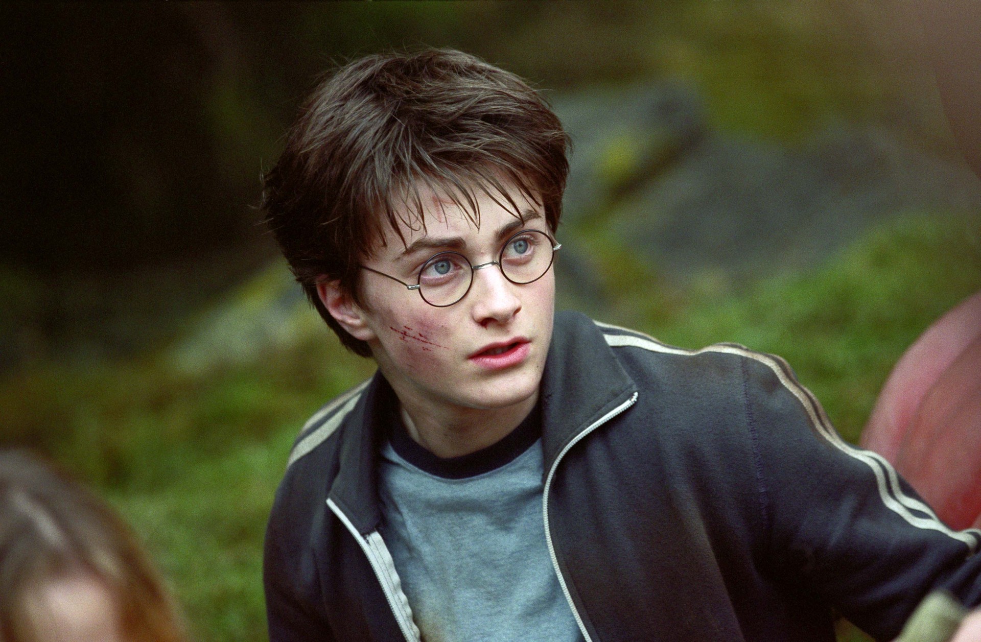 Daniel Radcliffe as Harry Potter.