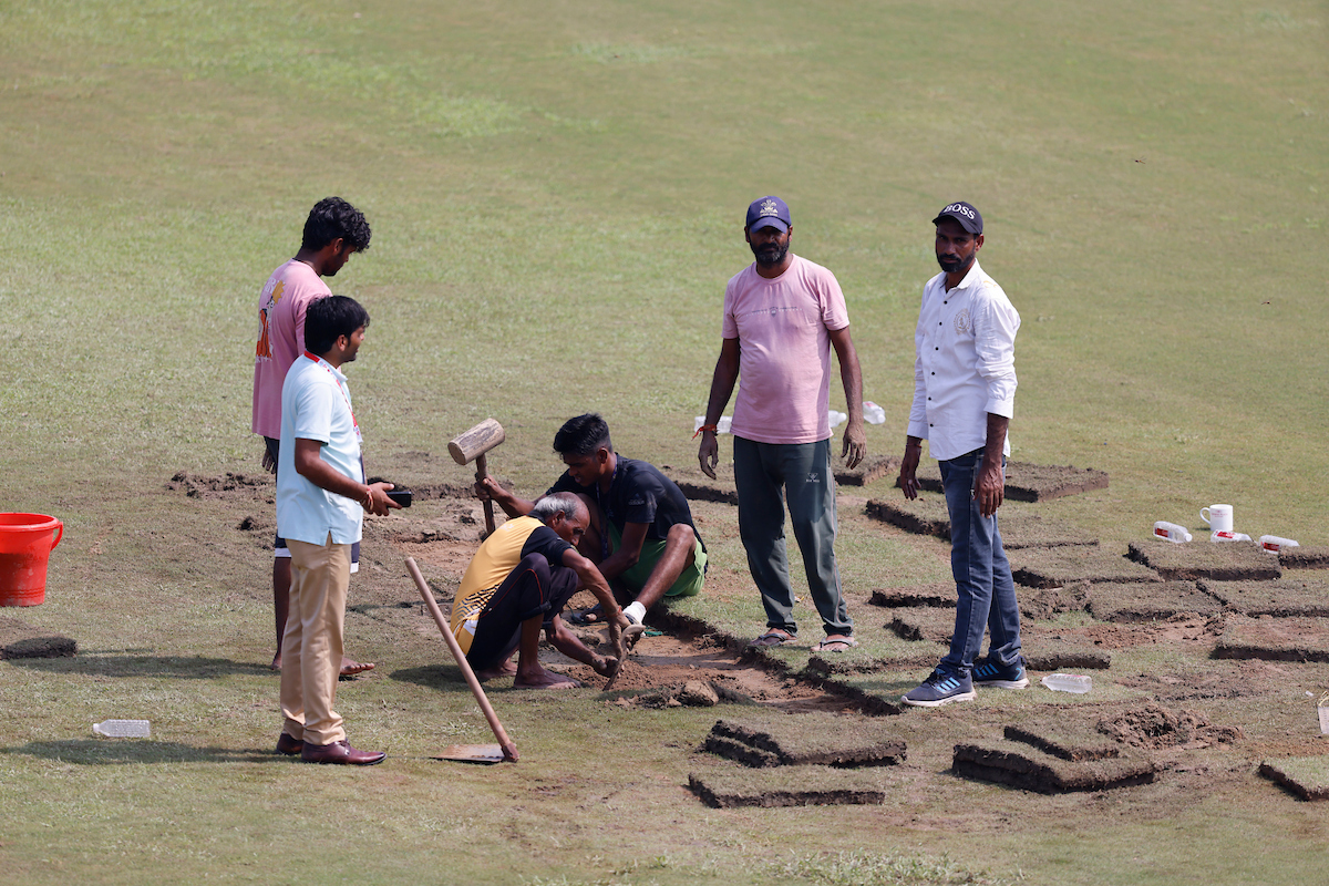 Farcical scenes emerged from Greater Noida on day two as ground staff tried in vain to ready the outfield. Photo / Photosport