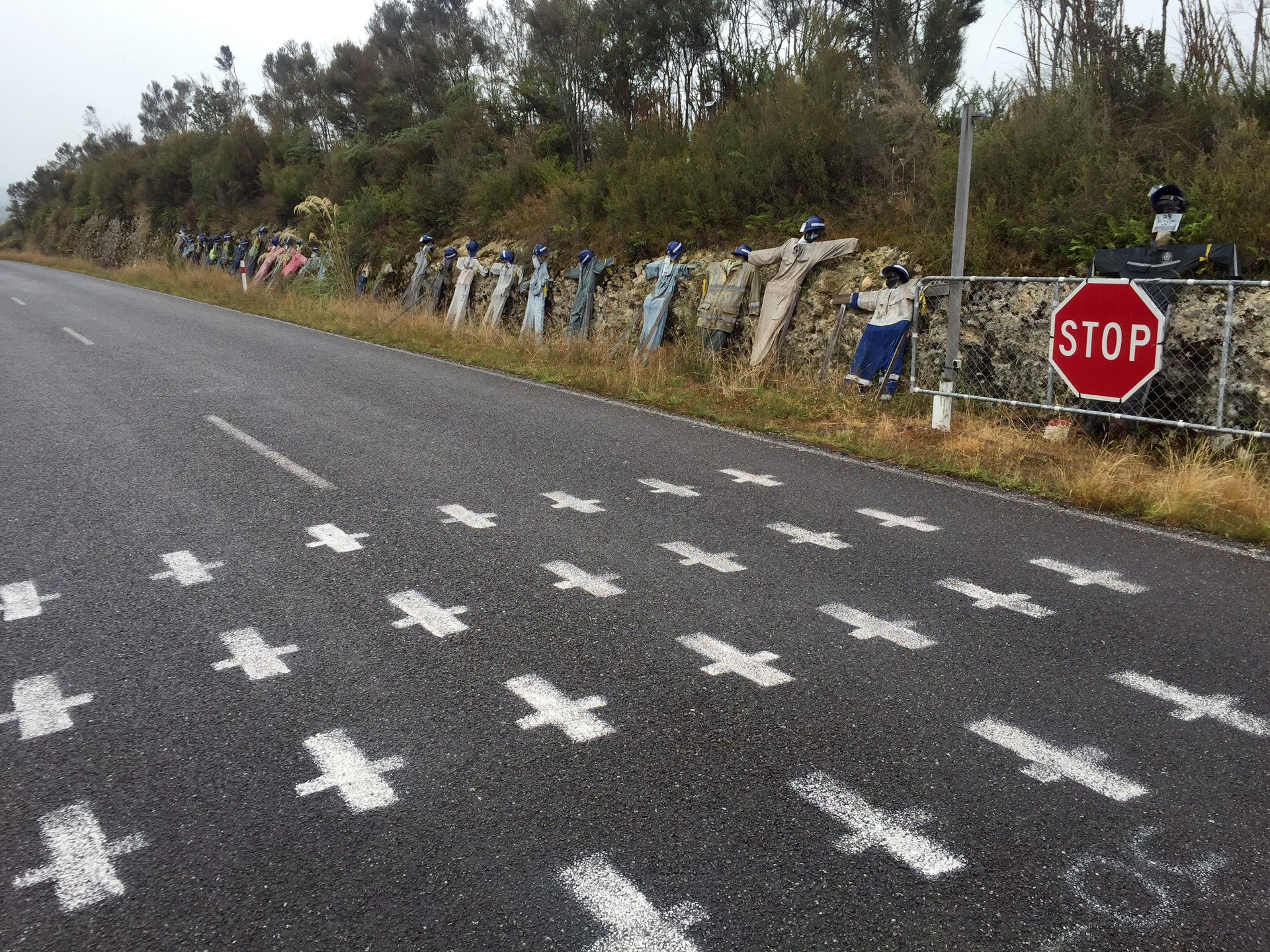 A memorial to the men who died in 2010, along the access road to the mine. Photo / Kurt Bayer