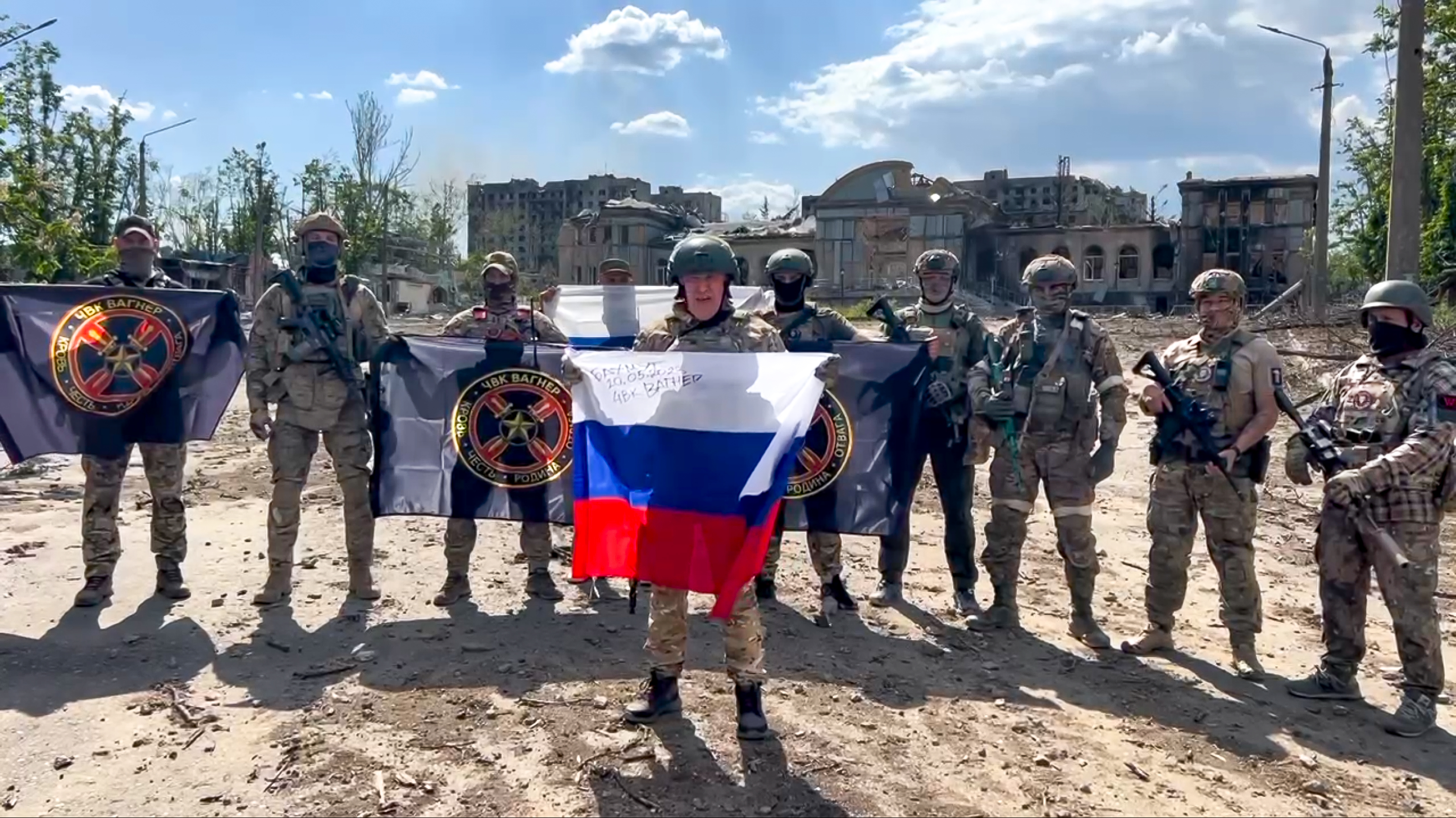 Yevgeny Prigozhin, the head of the Wagner Group military company speaks holding a Russian national flag in front of his soldiers in Bakhmut, Ukraine. Photo / AP