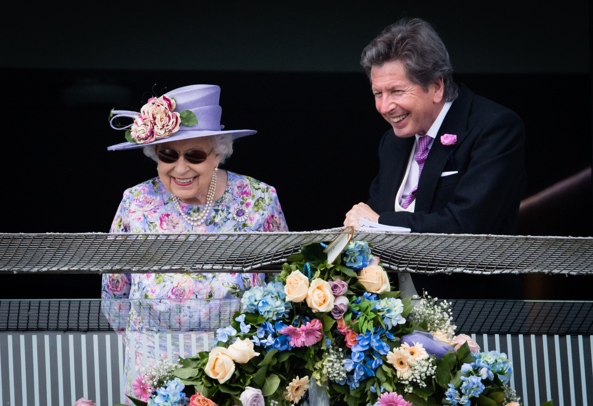 Queen Elizabeth II and John Warren watch the racing as she attends the Epsom Derby in 2018. Photo / Getty Images