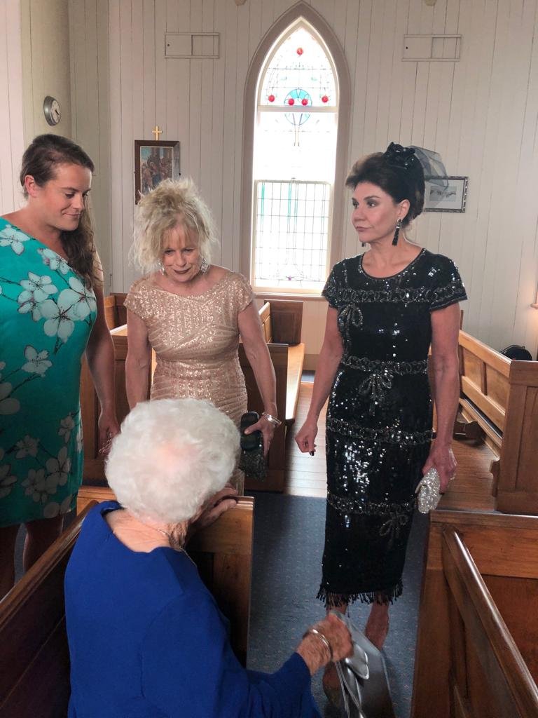 Philip Polkinghorne's sister Ruth Hughes, in the cream dress, at Ben Polkinghorne's wedding.