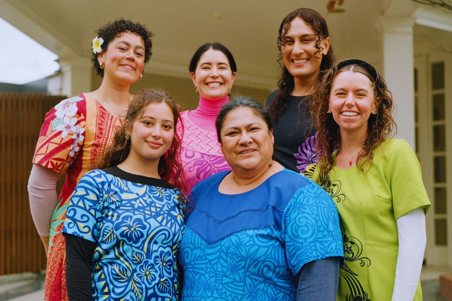 Lead actor of Tinā Anapela Polataivao (centre foreground) flanked by the film's wardrobe department.