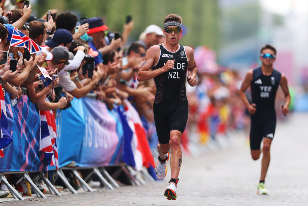 Hayden WIlde leads Alex Yee on the run leg. Photo / Getty Images