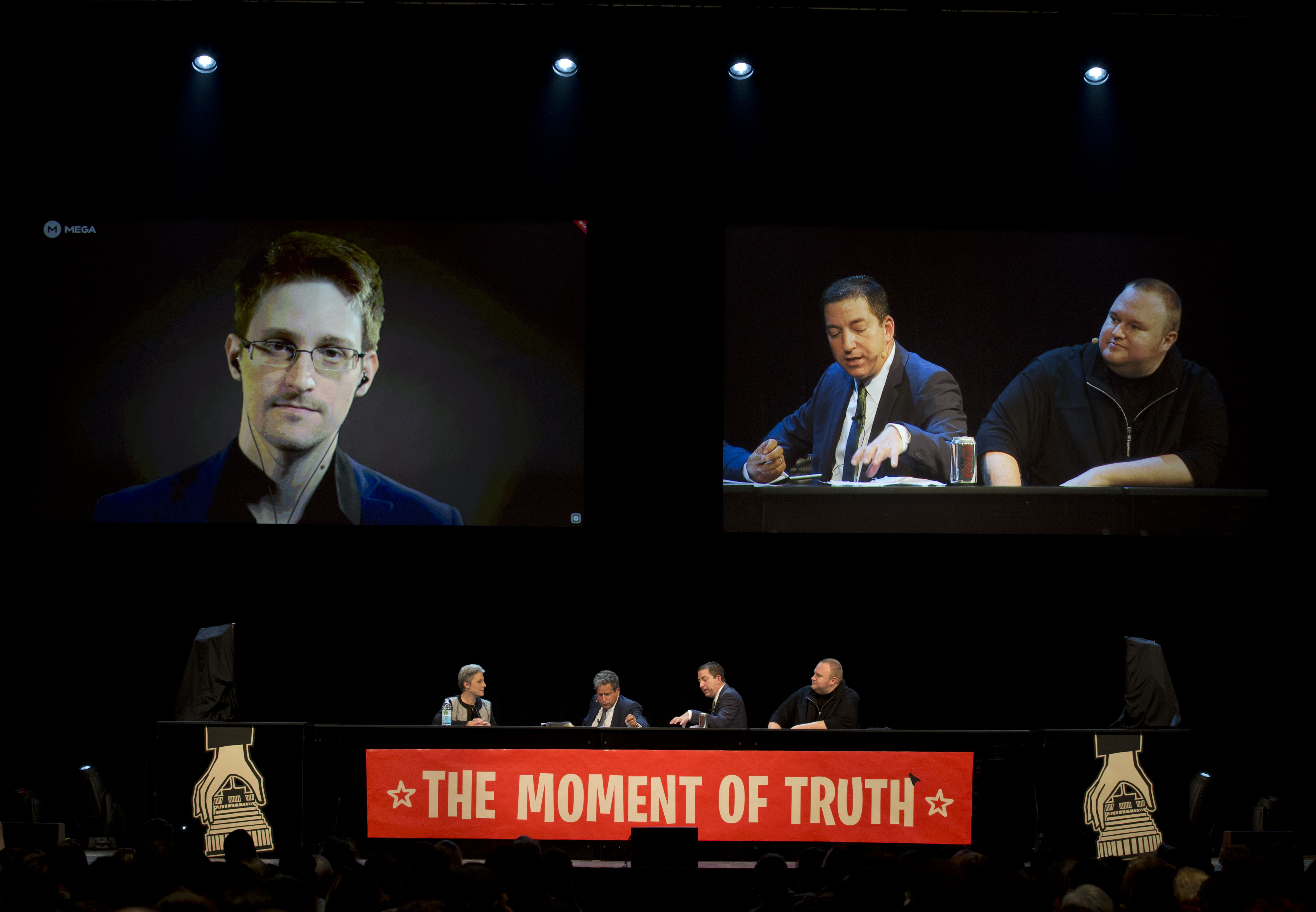 NSA whistleblower Edward Snowden speaks via video link with journalist and author Glenn Greenwald and entrepreneur Kim Dotcom. Photo / Brett Phibbs
