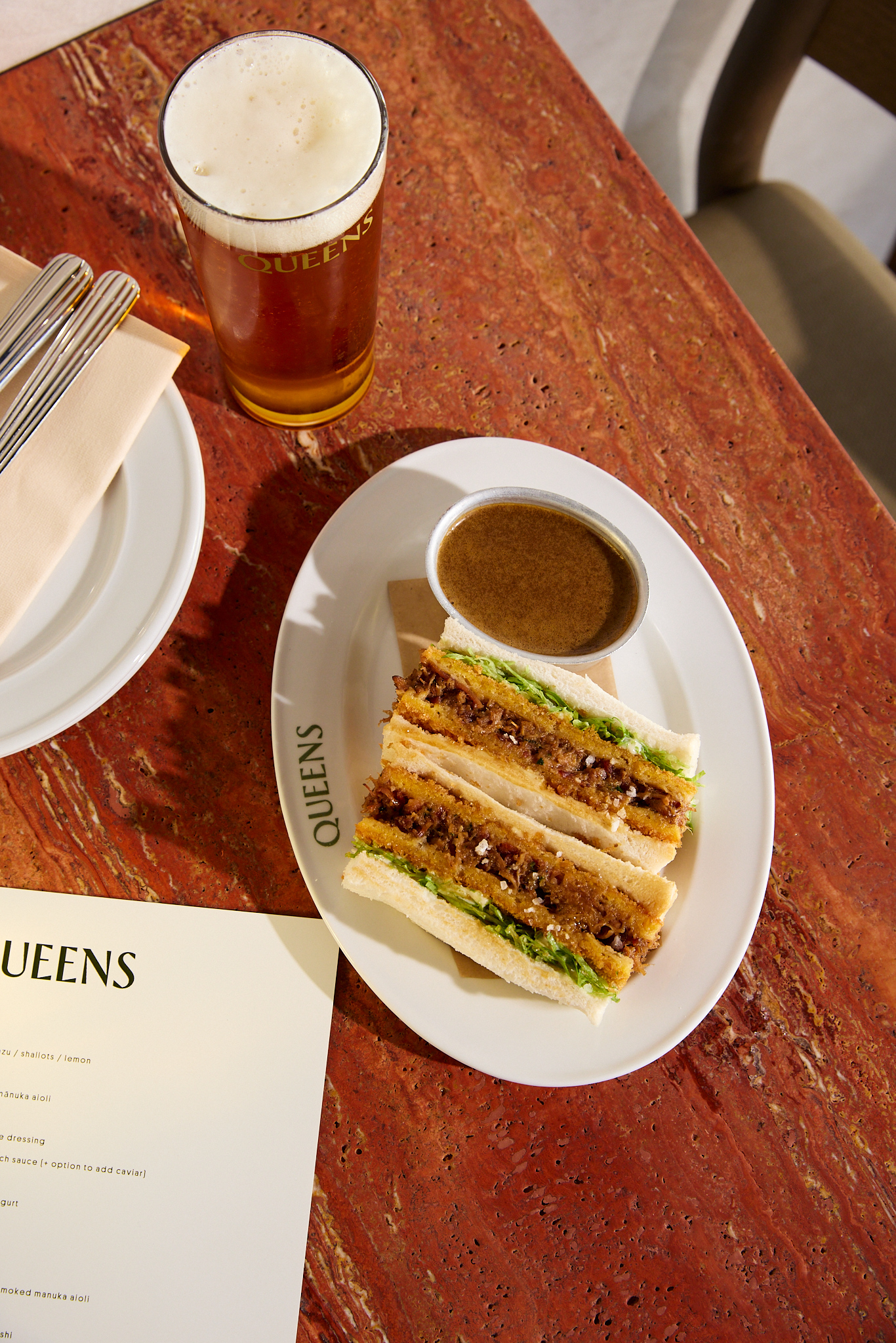 Pork belly sando with gravy. Photo / Jake Dennis