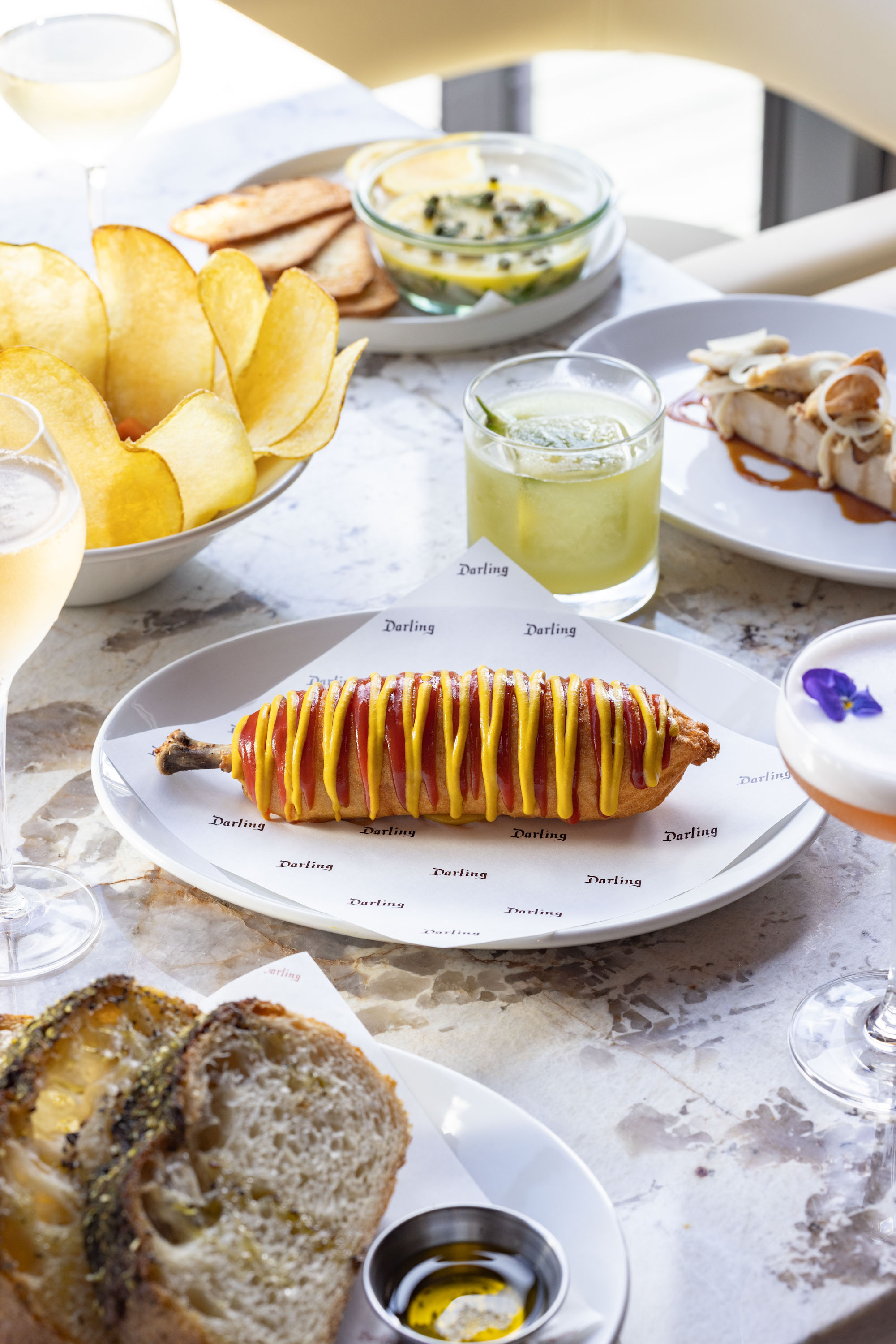Darling On Drake’s chicken leg corn dog, foccacia and mushroom parfait. Photo / Babiche Martens