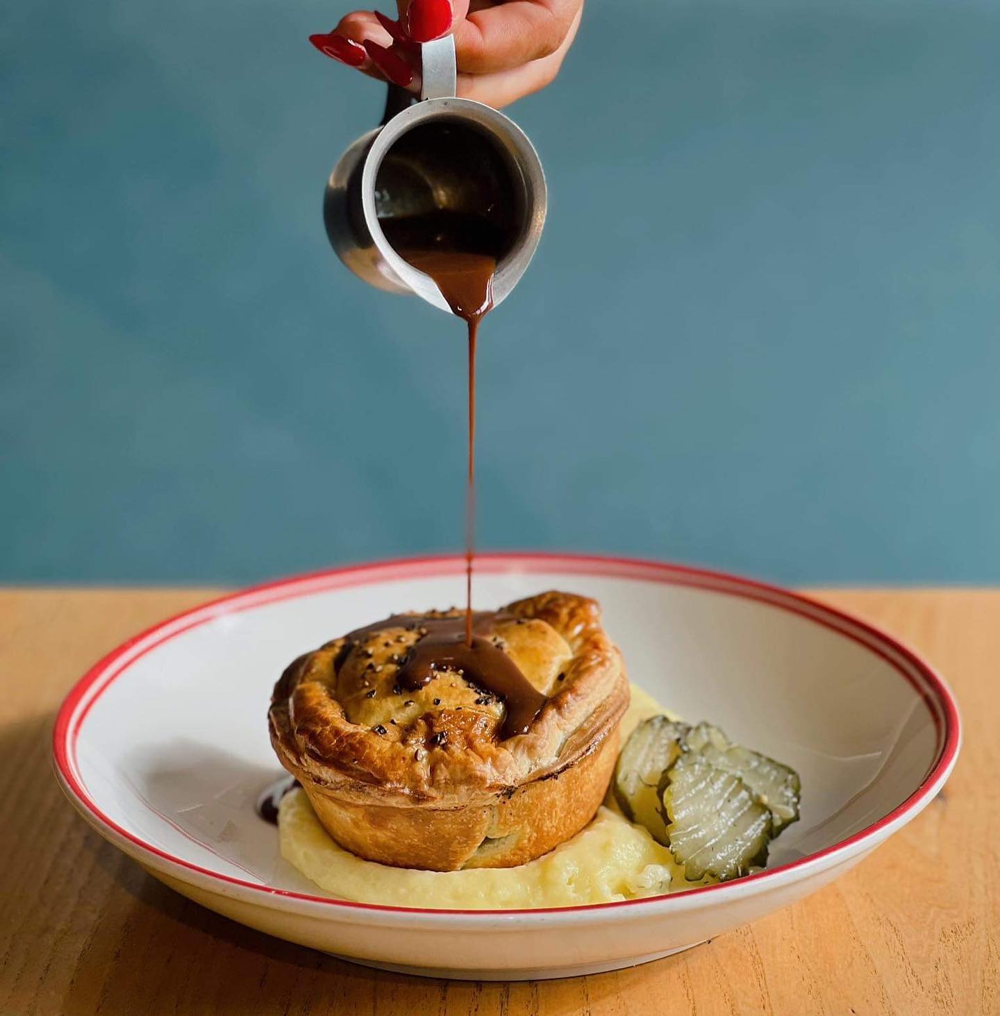 Pickle & Pie's venison pie with pomme aligot and a pinot noir and chocolate jus. Photo / @Pickleandpie_deli