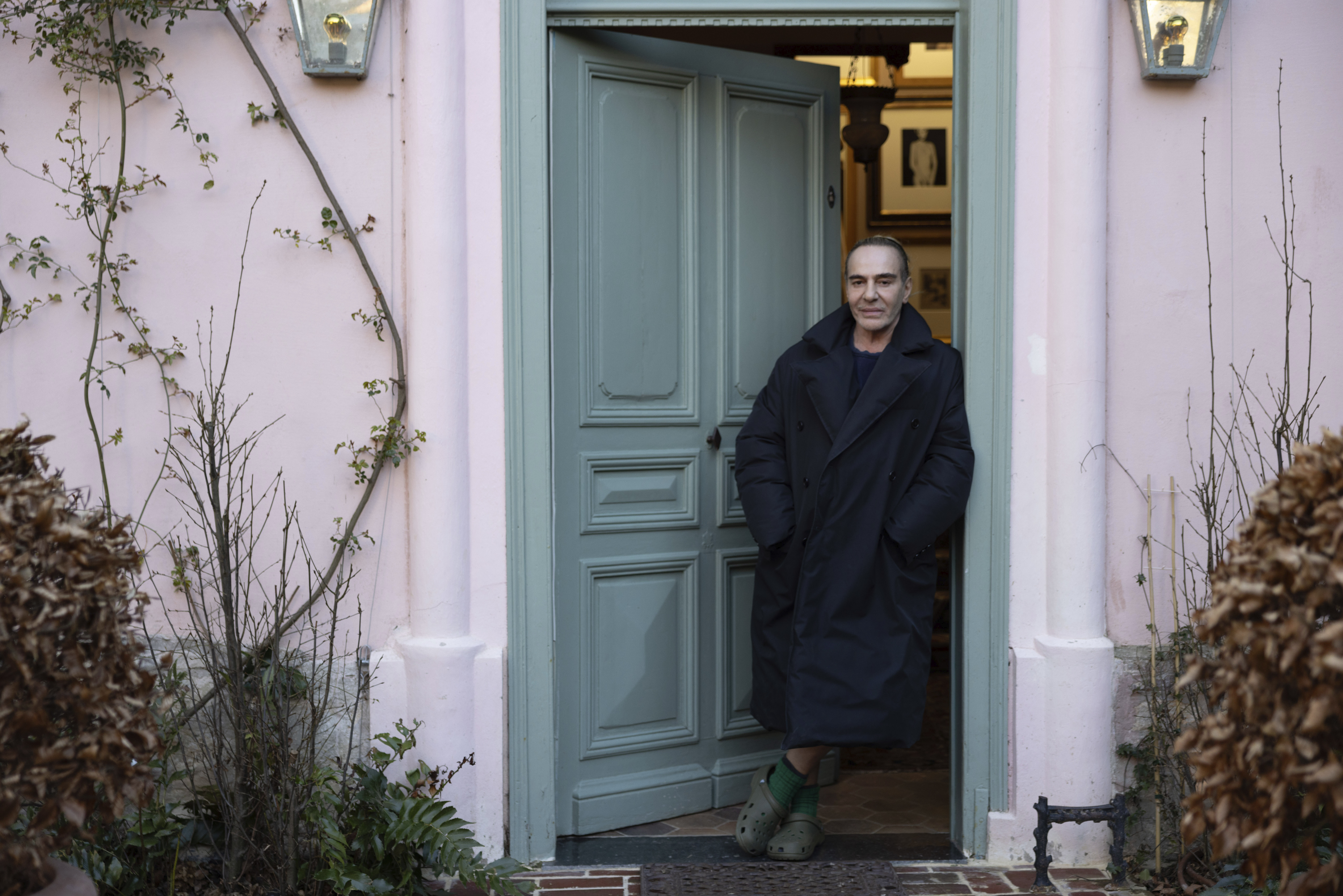 Fashion designer John Galliano, pictured in the doorway of his home, is the subject of a documentary by Kevin Macdonald. Photo / AP