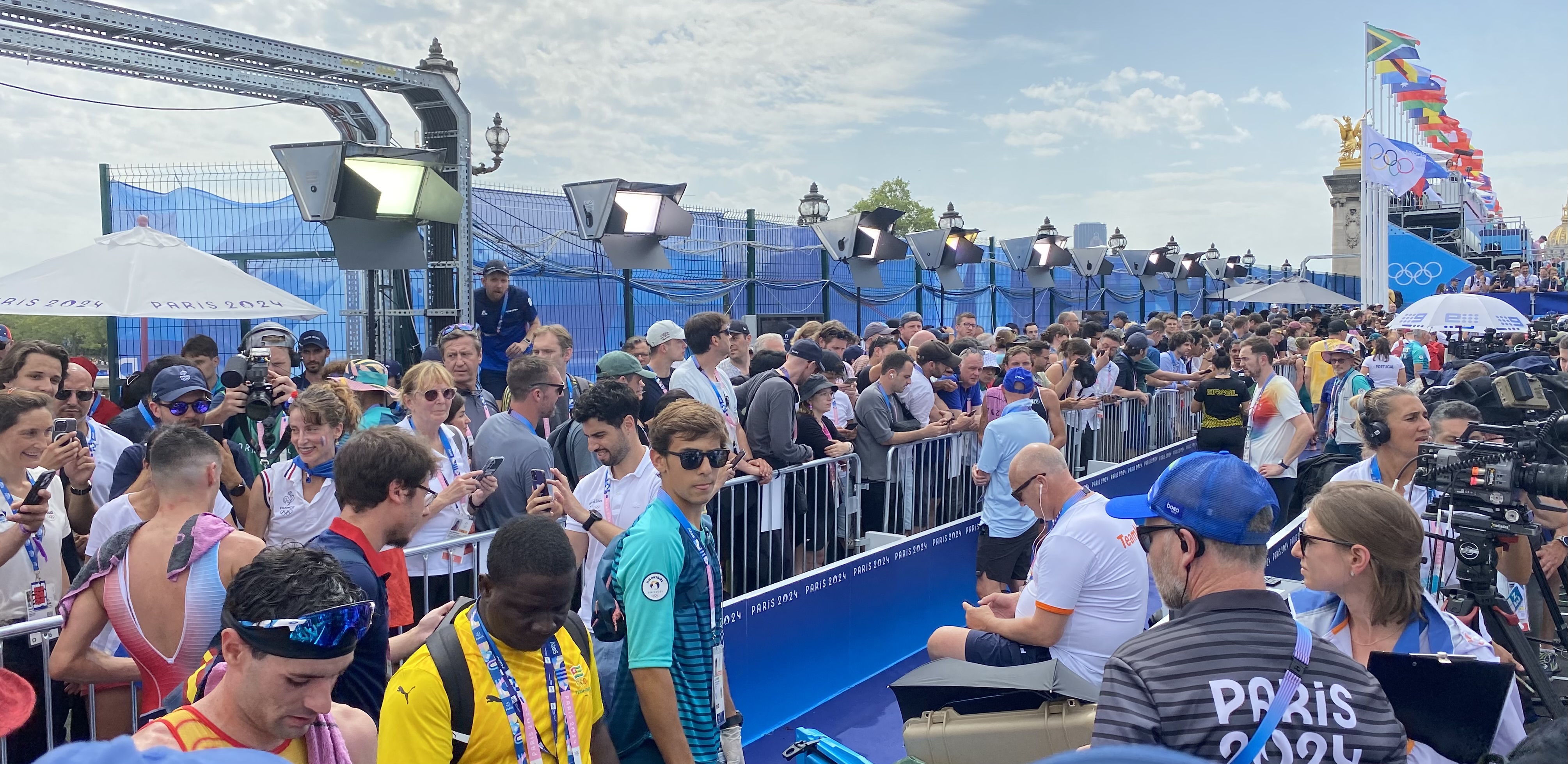 A packed media mixed zone at the end of the men's triathlon at the 2024 Paris Olympics. Photo: Michael Burgess/NZH.