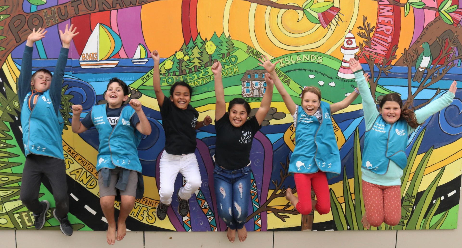 Riverview School Eco Warriors Alexander Wall (left), 9, Kavan Urlich, 11, Konging Lim, 10, Victoria Elu, 9, and Bayley Wood and Sylva Morris, both 10, celebrate their Enviroschools Green-Gold status. Photo / Peter de Graaf 