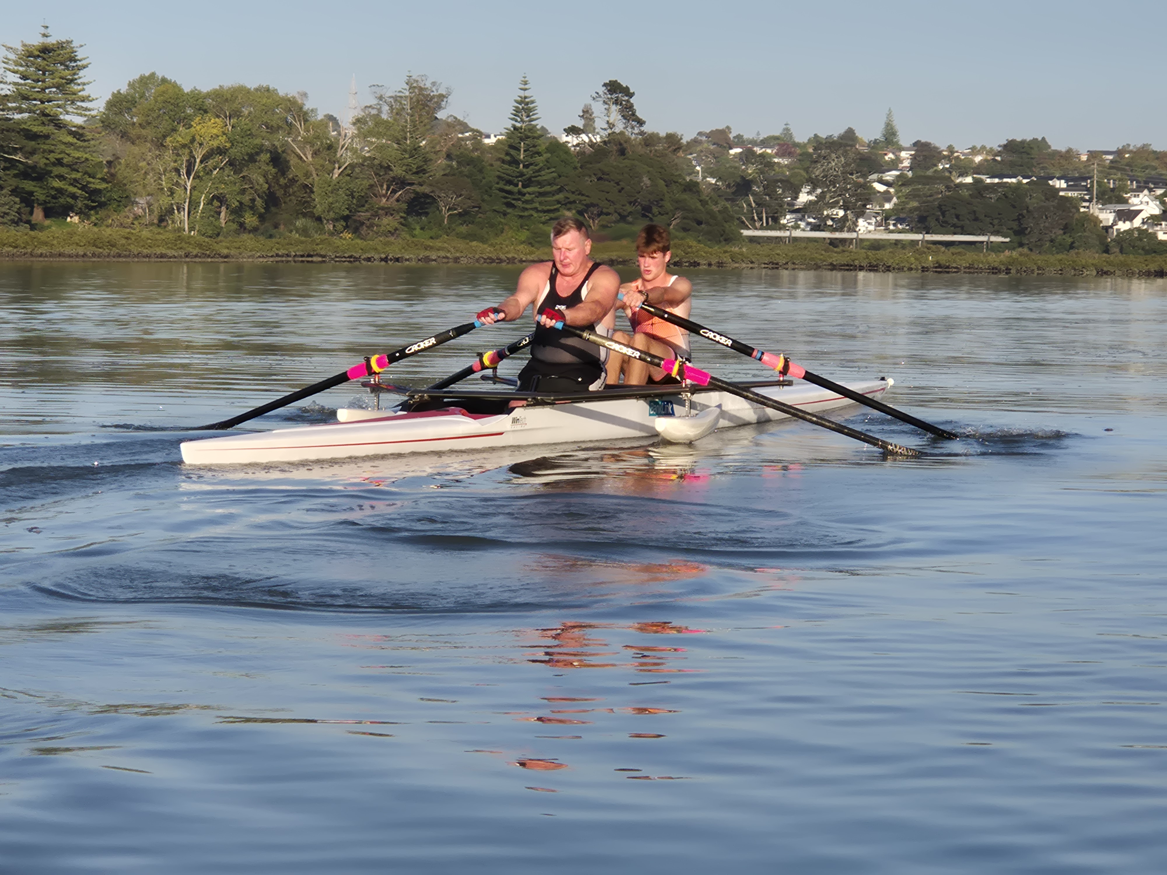 Ian Winson rows with his son, Ethan. Rowing has given Ian back the meditative release he lost when he could no longer run. Photo / Supplied