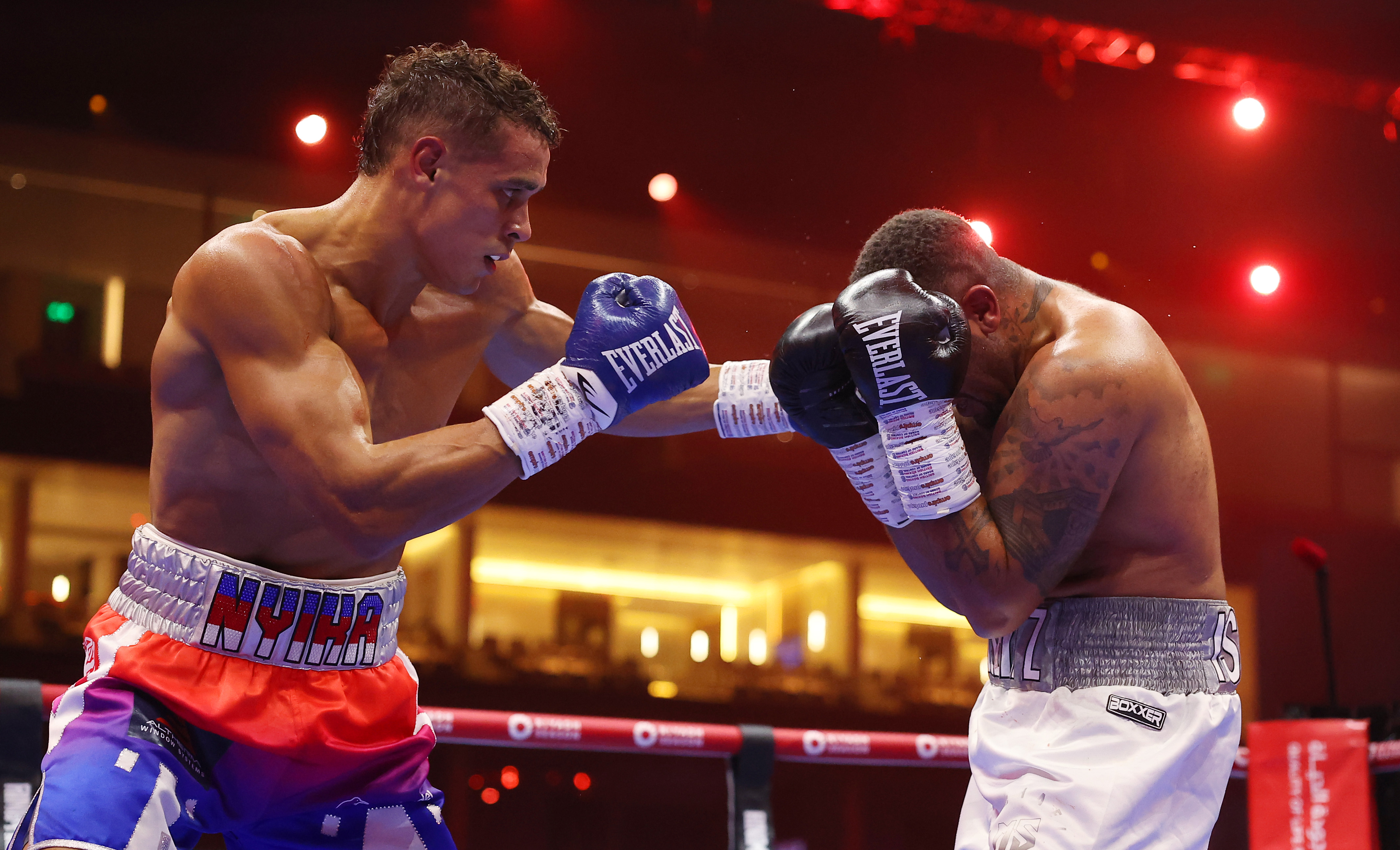 David Nyika overpowered Michael Seitz, claiming a fourth-round TKO win. Photo / Getty Images