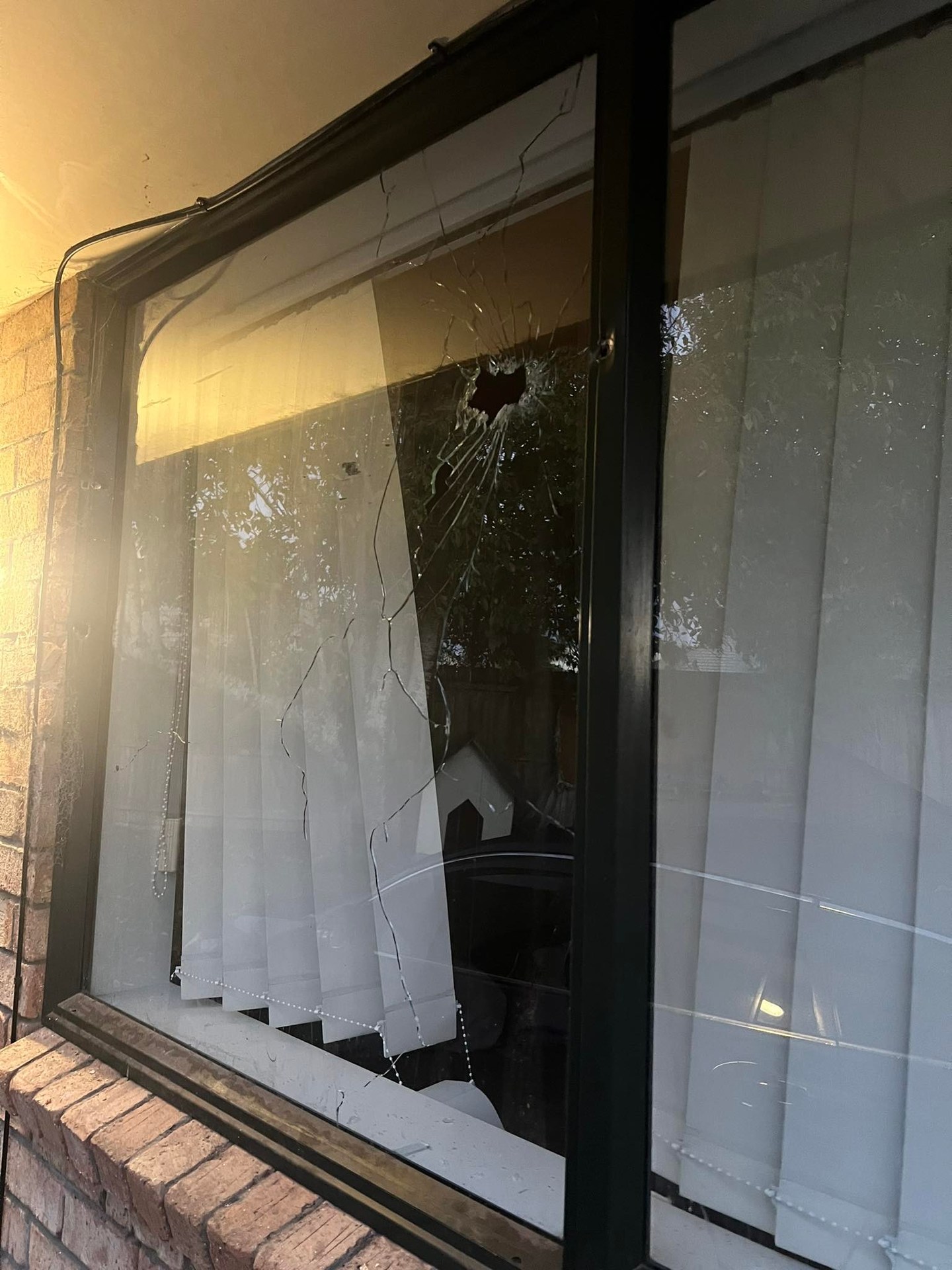 Shannon was inches away from being hit by bullets fired through her bedroom window. Photo / Supplied