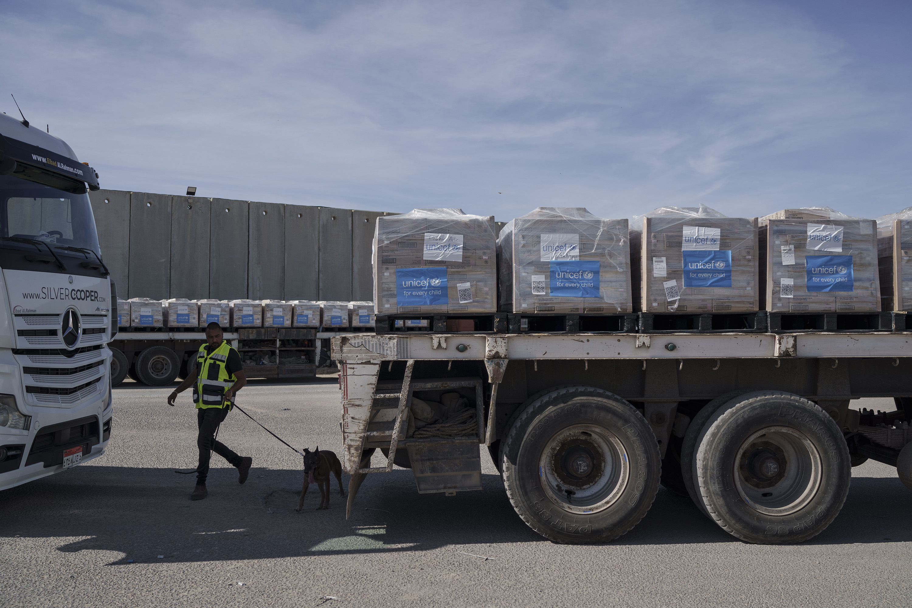 A border security guard inspects a truck carrying humanitarian aid to the Gaza Strip at the Kerem Shalom border crossing, one of only two entry points into the enclave. Photo / AP