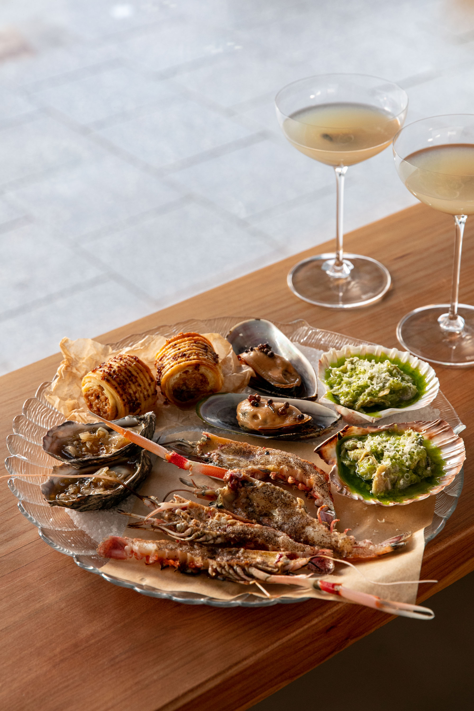 Alta's seafood platter and clam martini, photographed in 2022. Photo / Babiche Martens

