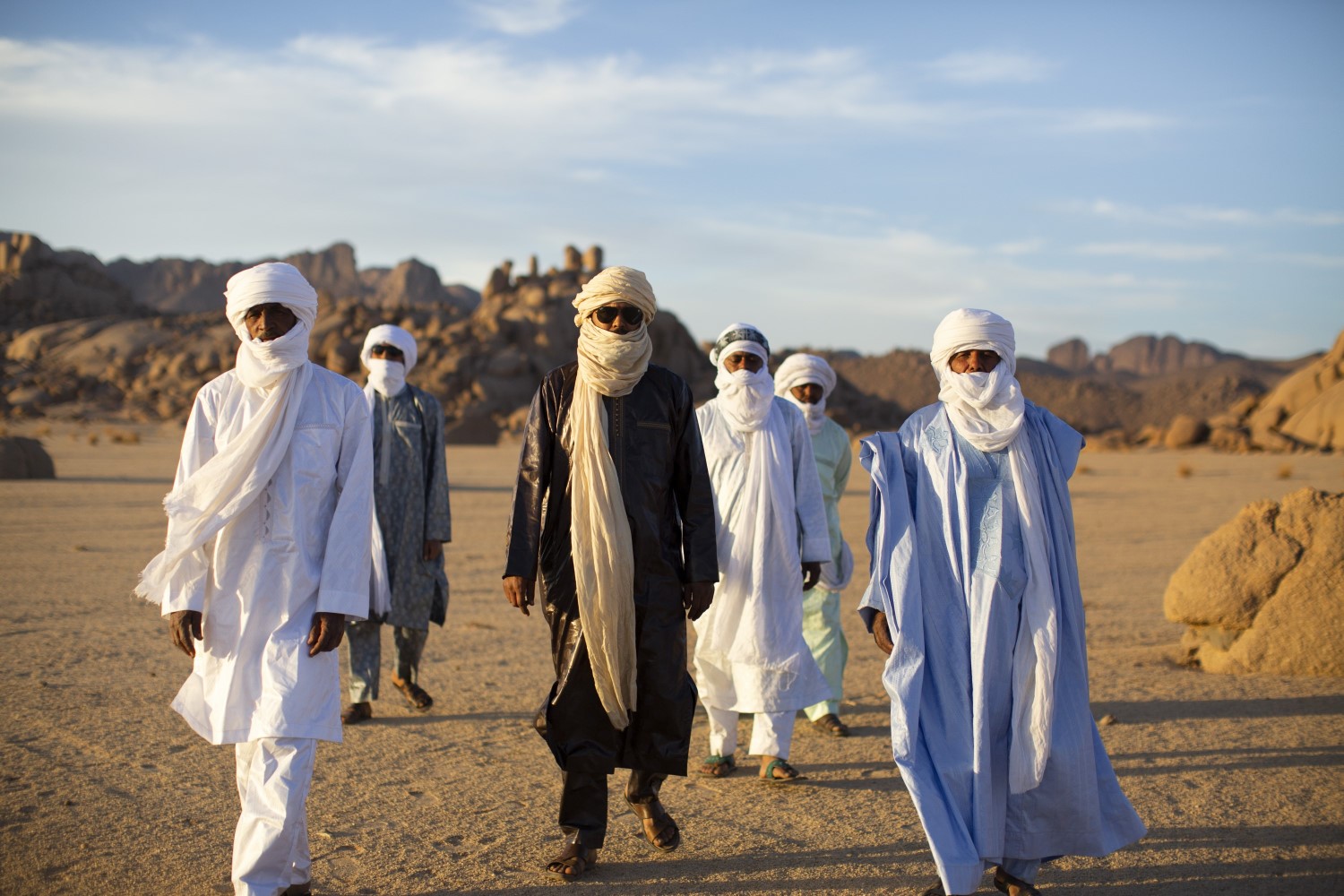 Tinariwen will bring their singular Tuareg sounds to Auckland and Wellington this May. Photo / Marie Planeille