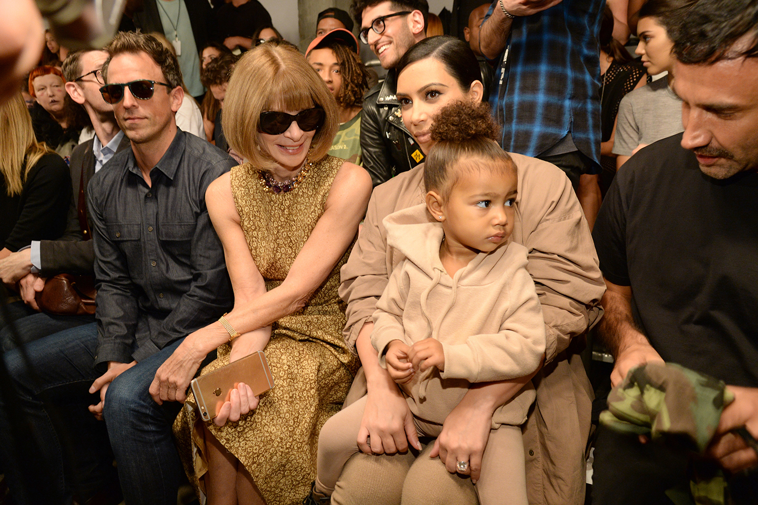 Anna Wintour, Kim Kardashian and North West front row at Yeezy 2015. Photo / Getty Images
